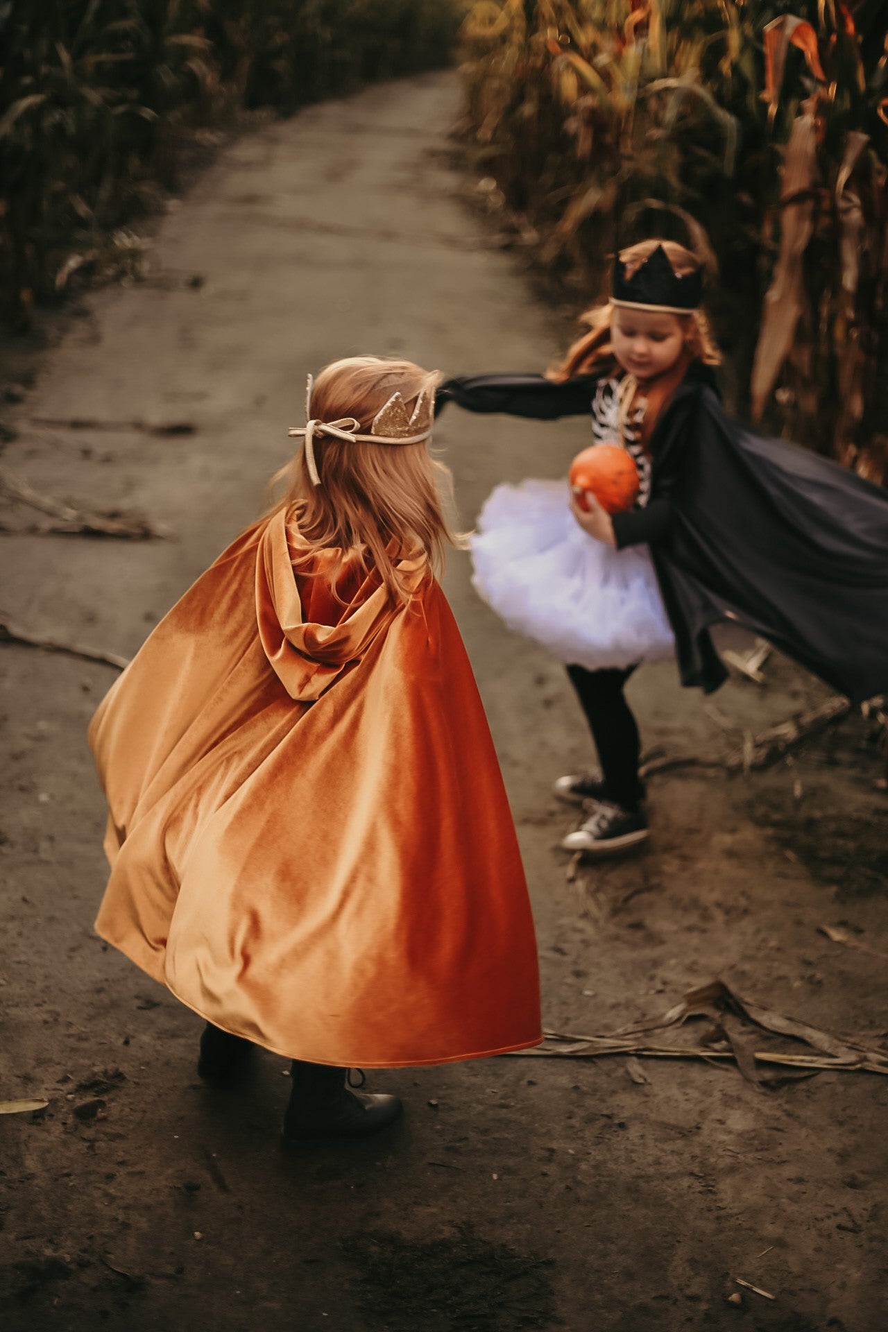 bold golden velour riding hood cape with a dramatic hood and snap closure for adventurous kids
