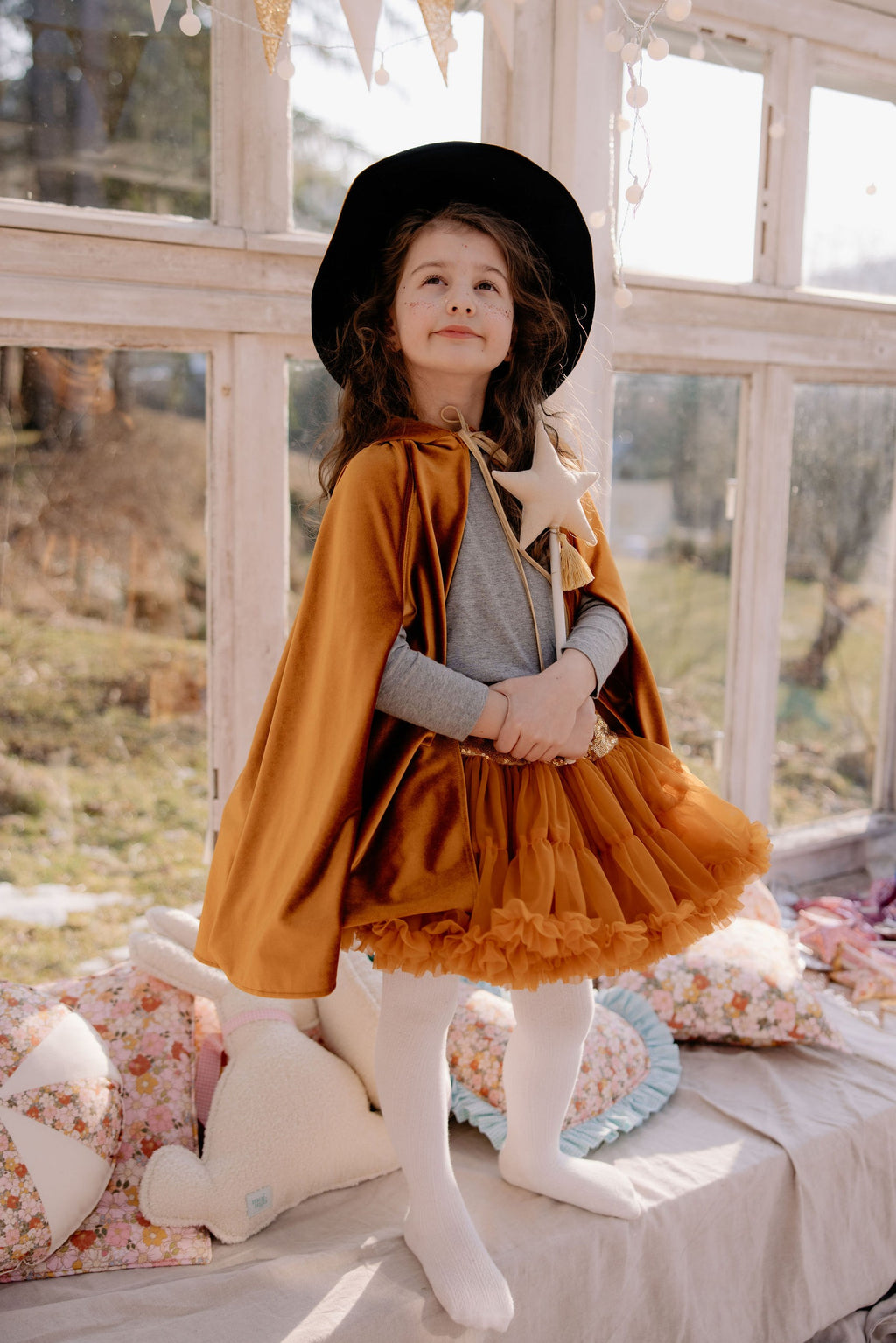 handmade golden velour kids cape with a deep hood and secure snap closure for adventurous play