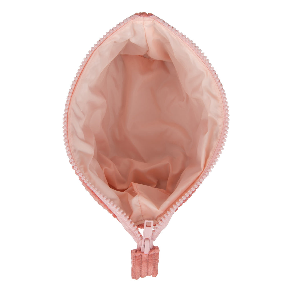 artisan coral makeup bag set open on a rustic wooden table with morning light