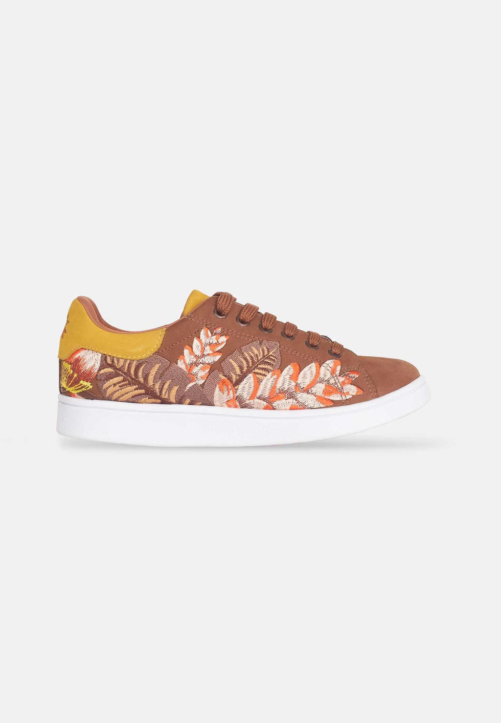 confident close-up of mangara womens brown suede sneakers with intricate floral embroidery