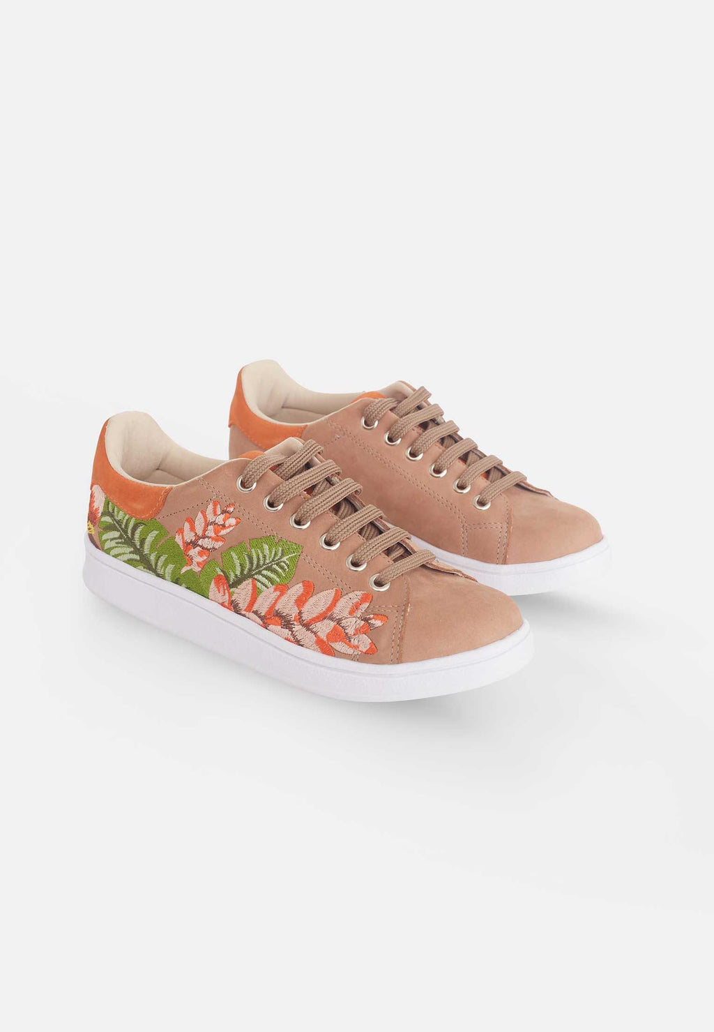 playful close-up of mangara floral embroidery on soft brown suede sneakers
