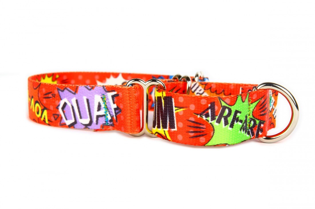 soft red graffiti martingale dog collar on a cozy bed for secure walks