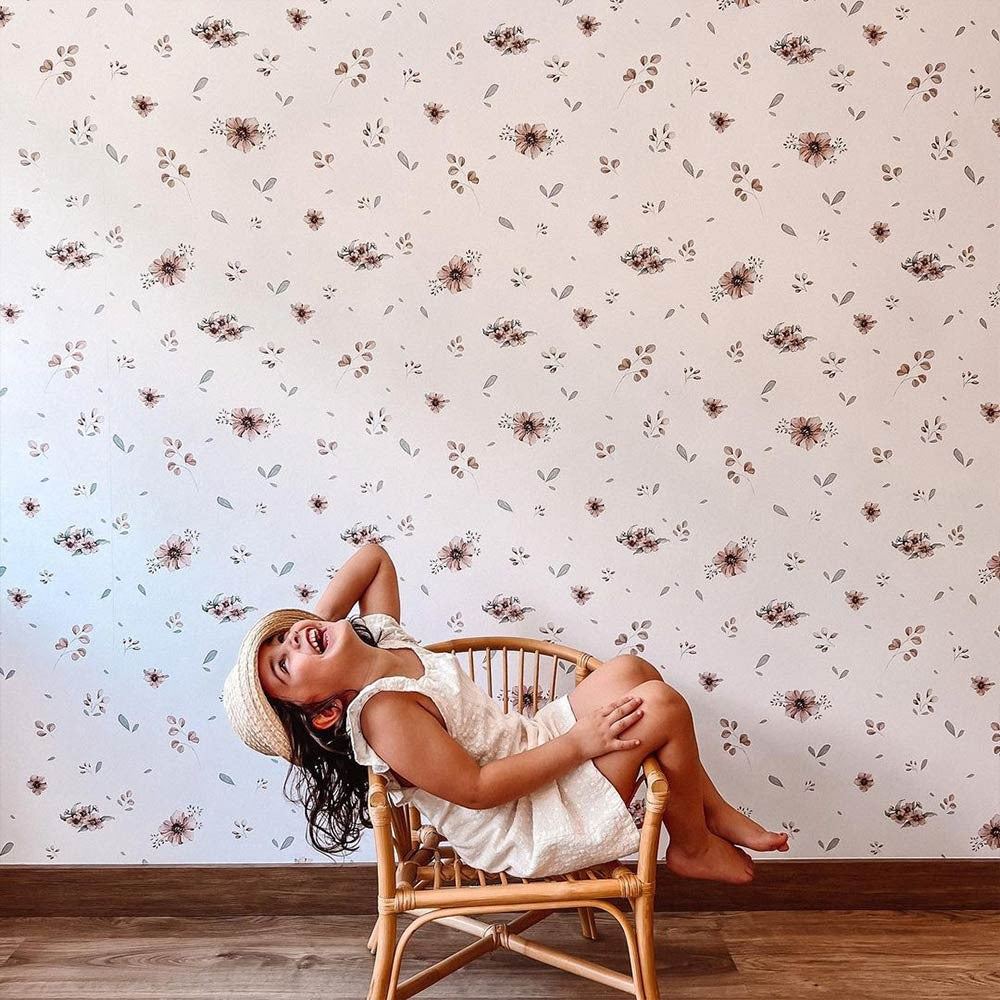 soft morning light on a delicate floral wallpaper for a sweet and comforting nursery