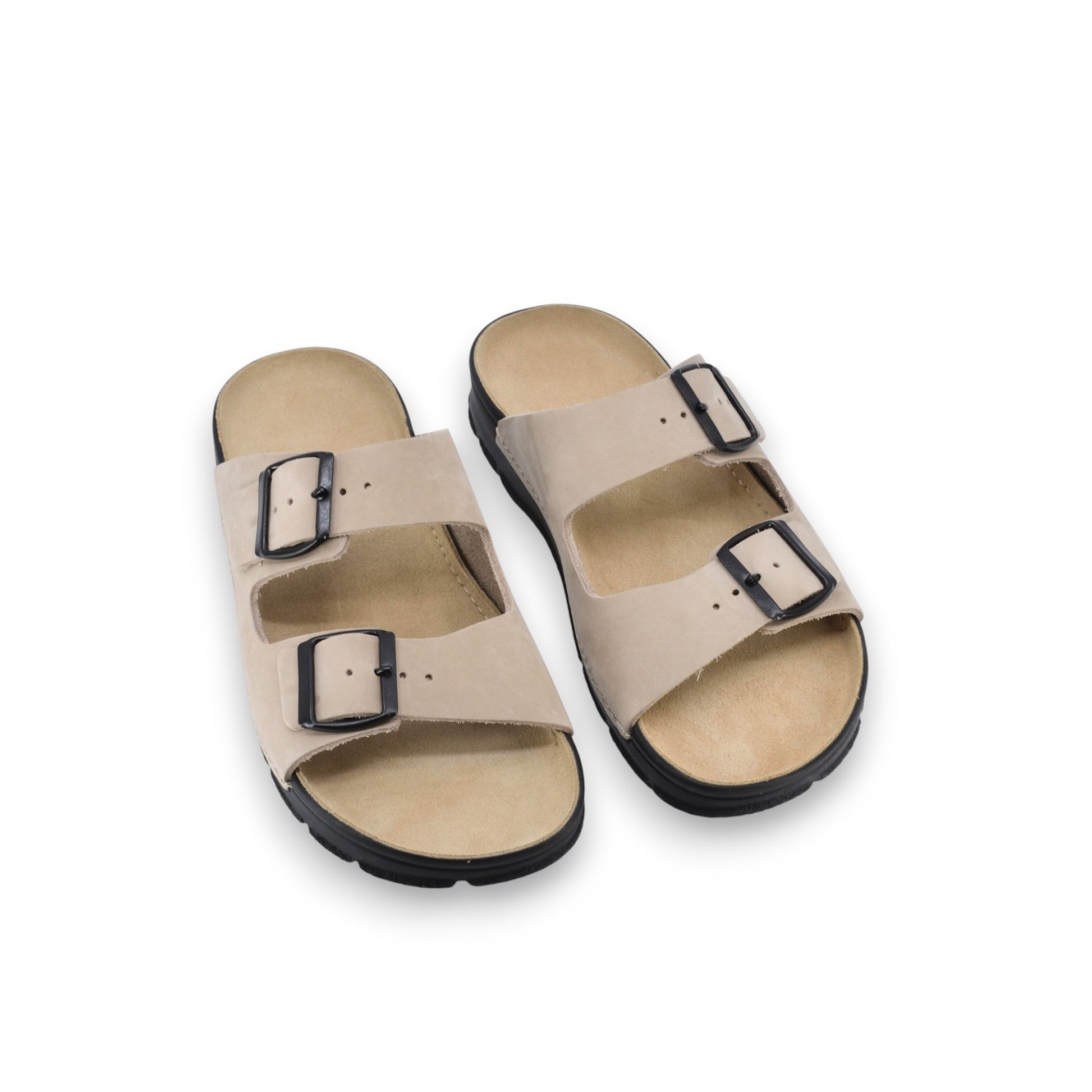 close-up of the adjustable buckle straps on beige meeliku leather sandals, highlighting their functional and practical design