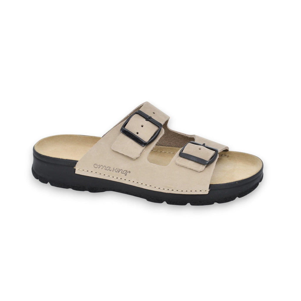 elegant beige leather sandals with adjustable buckles, shown on a marble surface in soft morning light