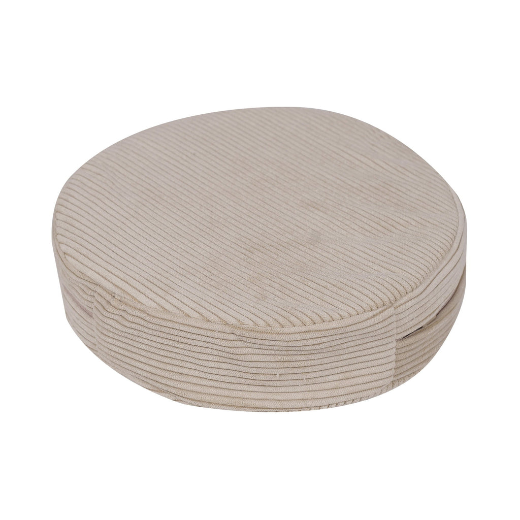 ecru corduroy children's sofa with two removable poufs in a bright, practical room setting