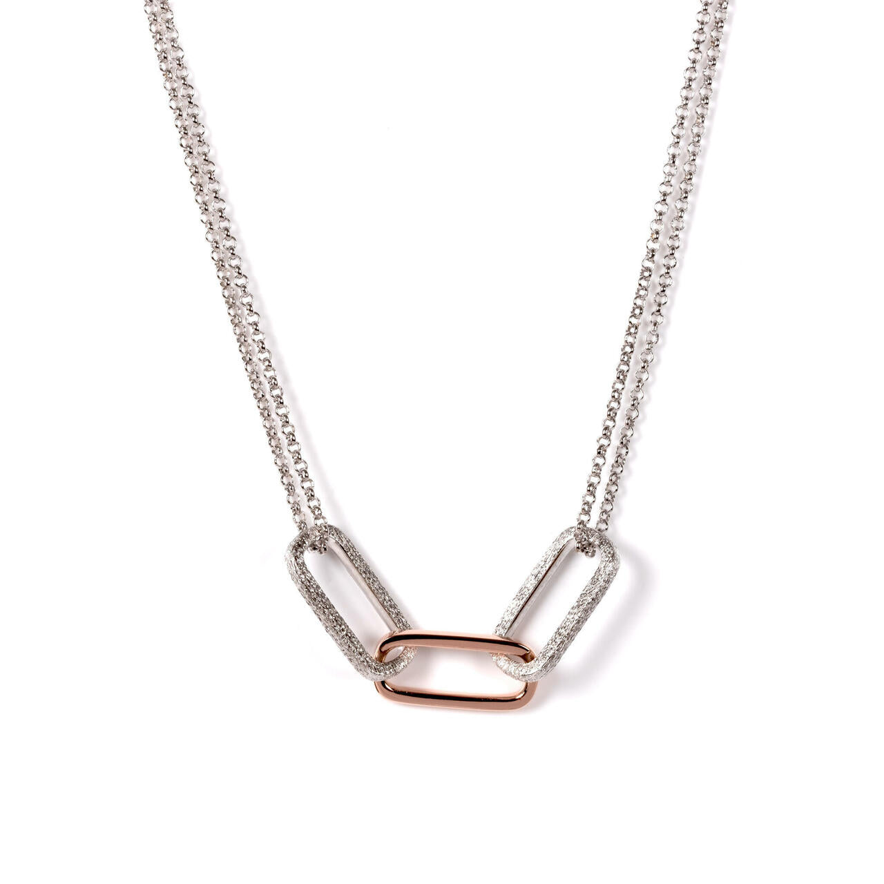 bold metropolitan necklace in sharp studio light highlighting its modern rhodium-plated silver design