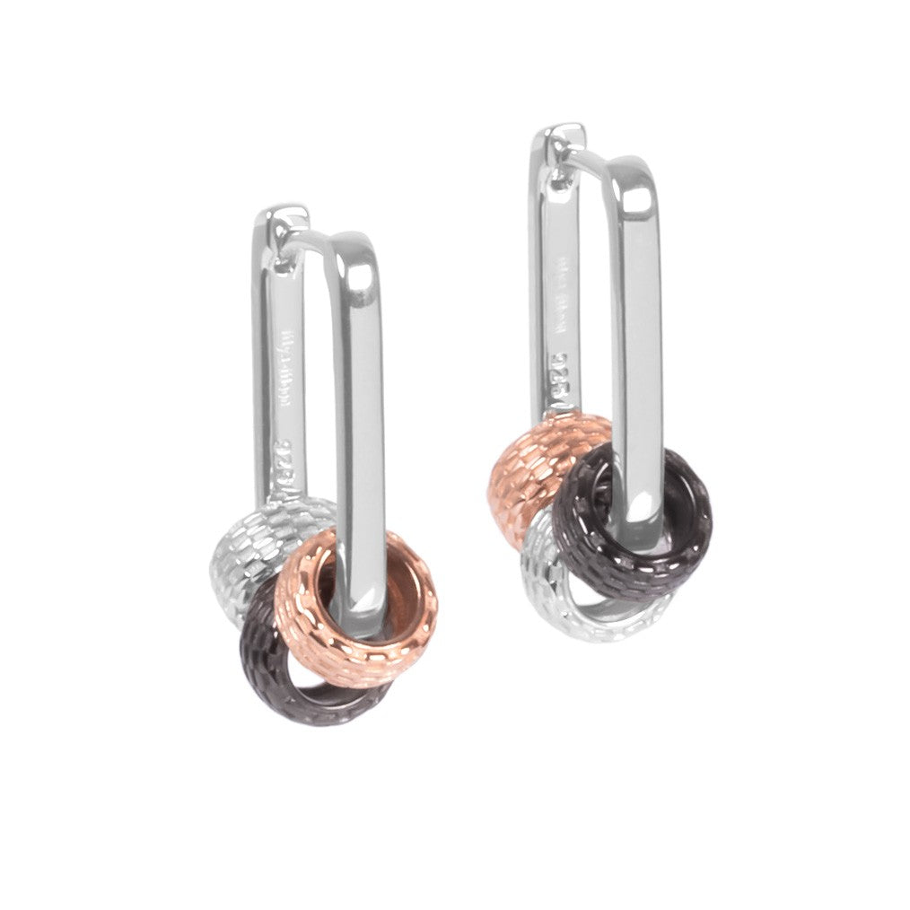 bold metropolitan charm hoop earrings in sterling silver with three detachable city-inspired charms