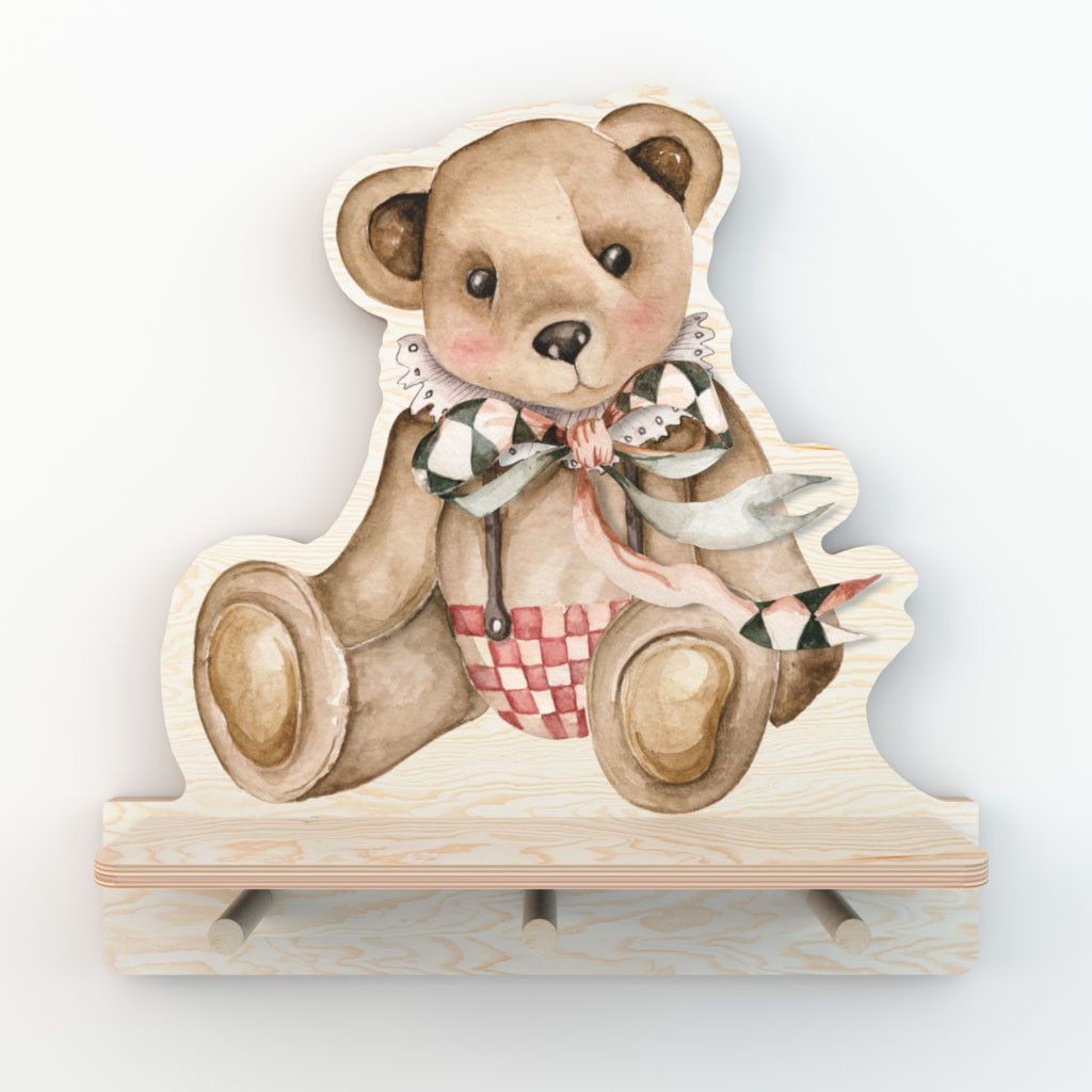 close-up of a functional plywood teddy bear shelf holding keys and a small bag on its pegs