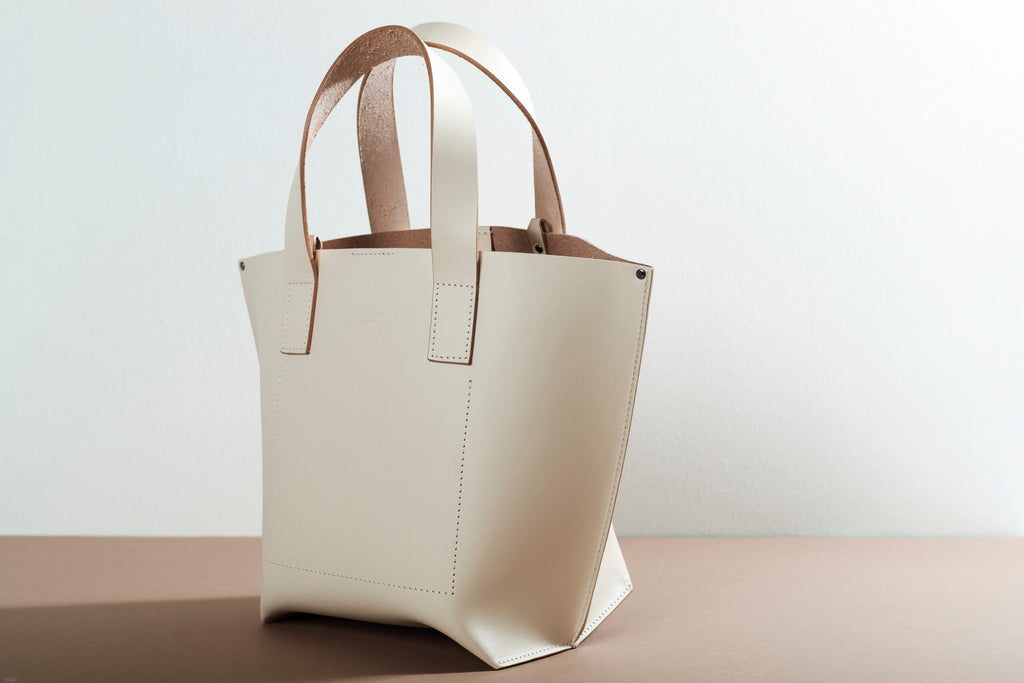 Your Perfect Companion: The Versatile Model Bucket Bag by Craftory at www.brixbailey.com
