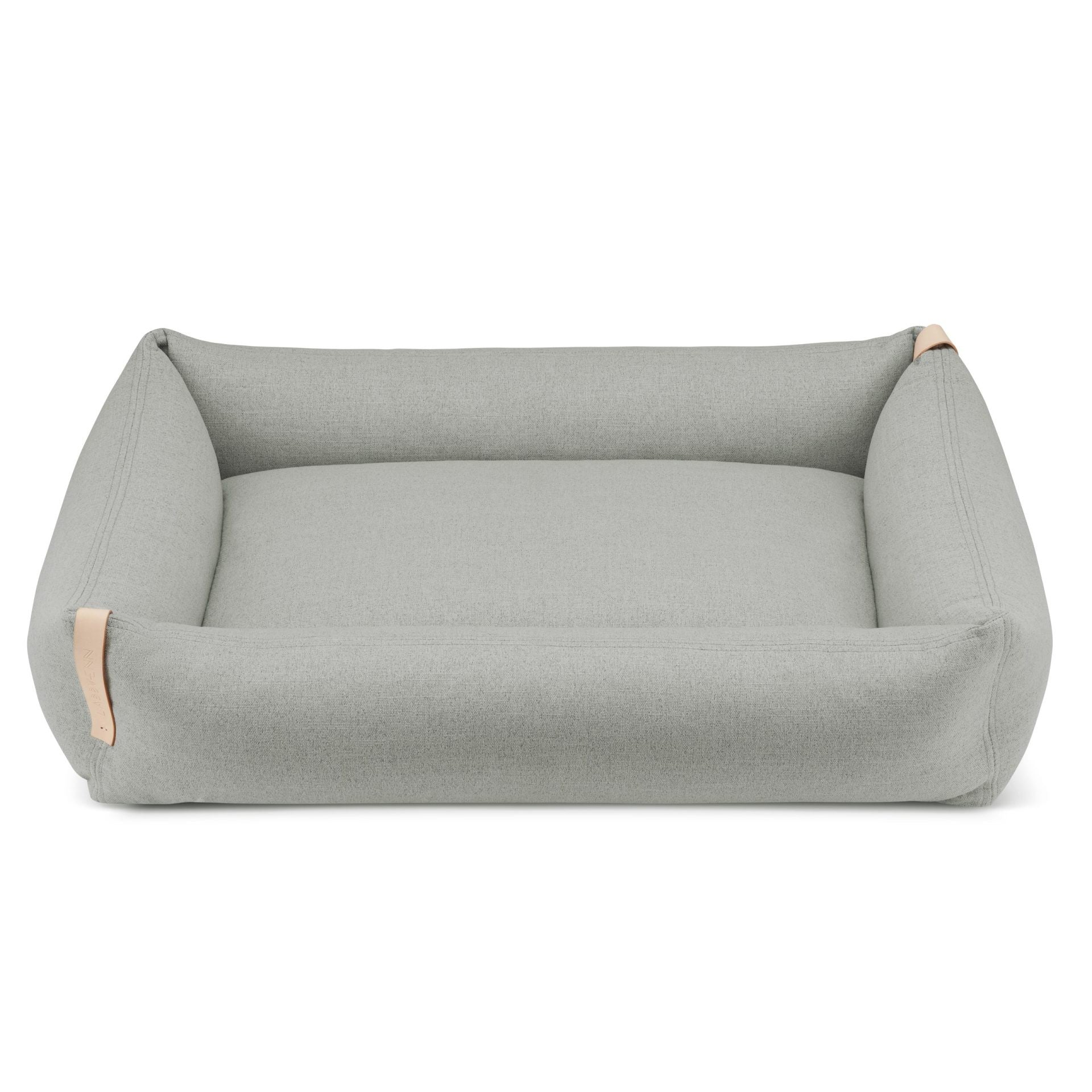 bold grey moe dog bed in a modern living room setting