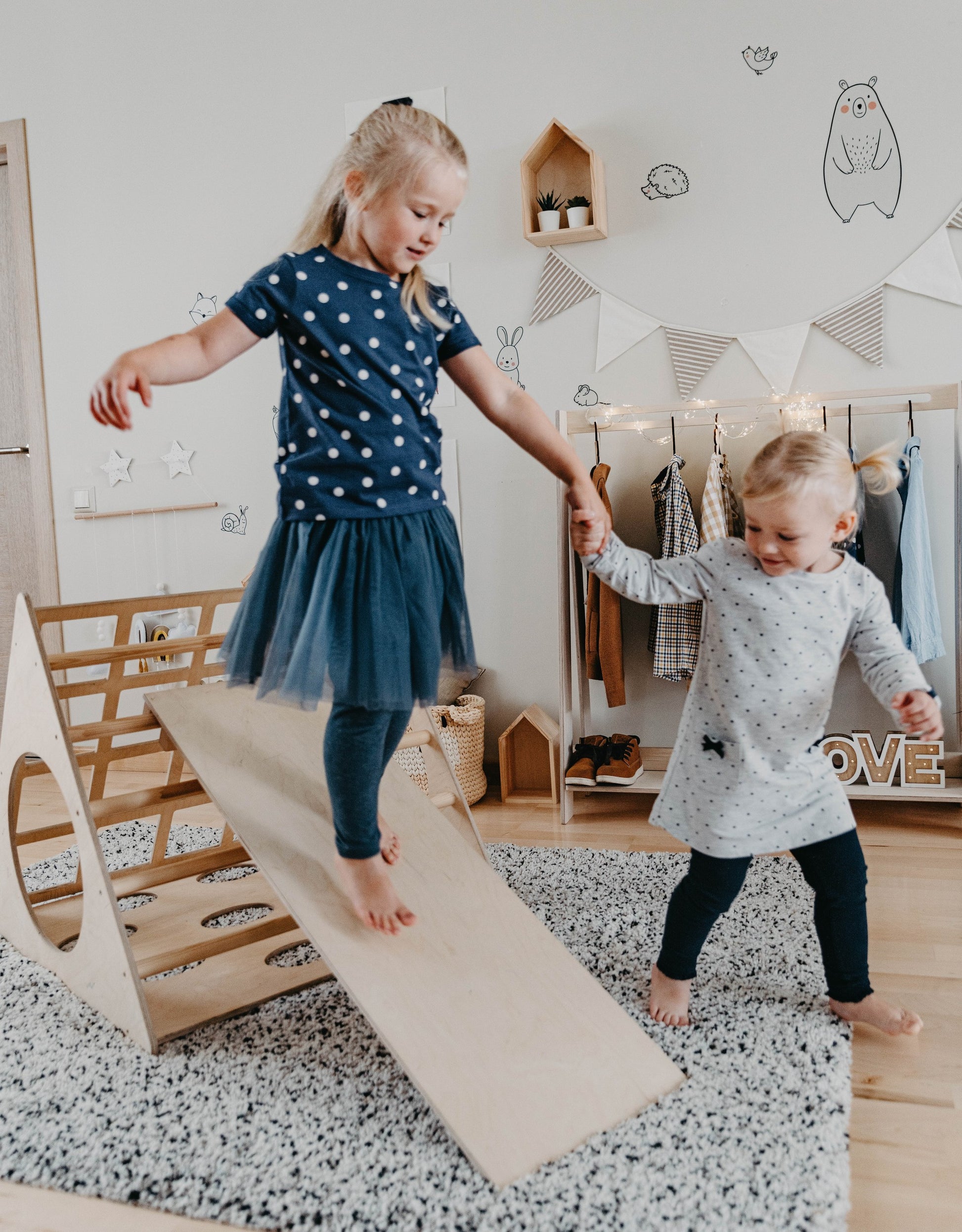 bold front view of the montessori 3-angle climber with ramp, showcasing its sturdy birch plywood build and confident design