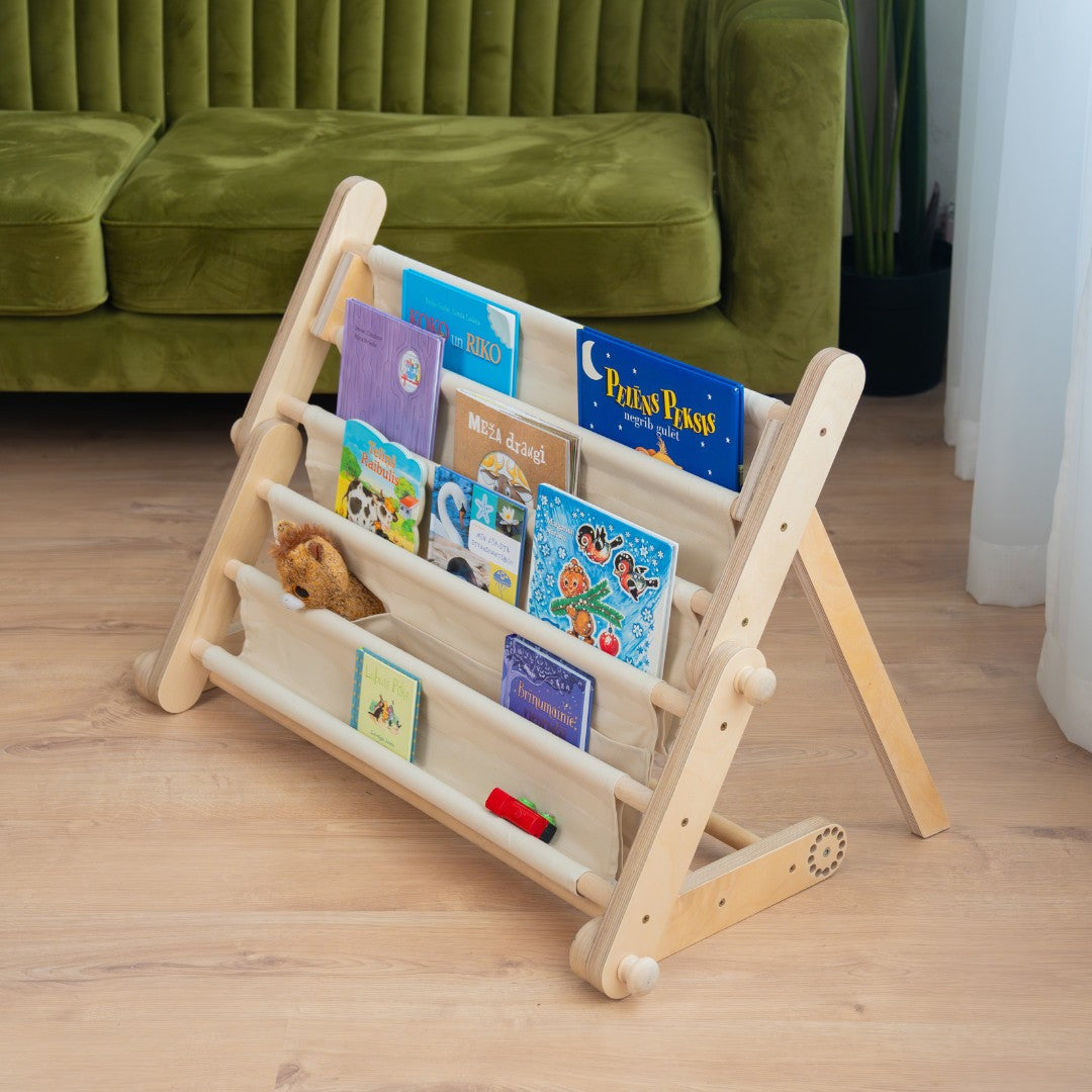 montessori bookshelf attachment in a bright, airy room showcasing its easy velcro setup and front-facing book display