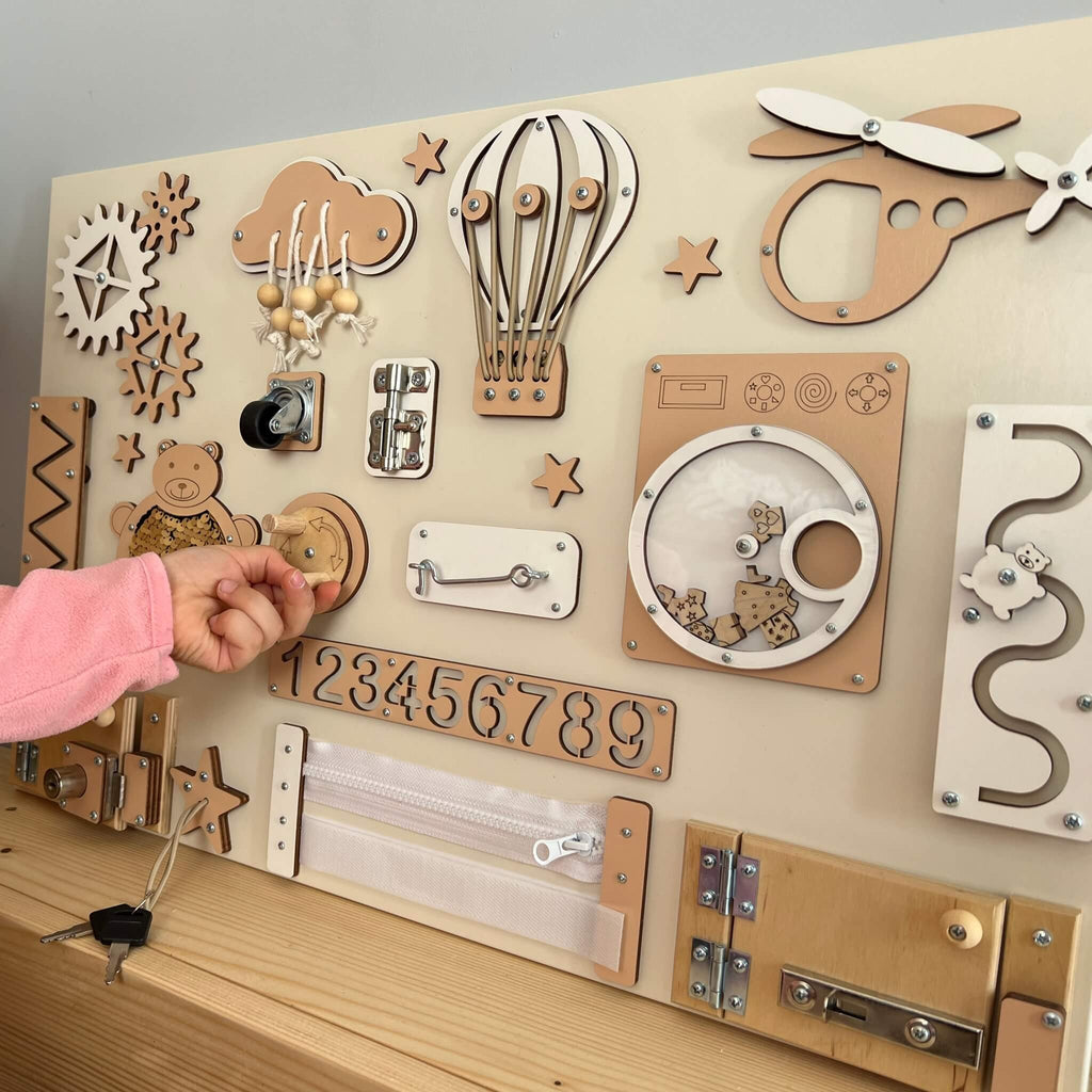 Montessori busy board with doors and locks (40×60 cm)