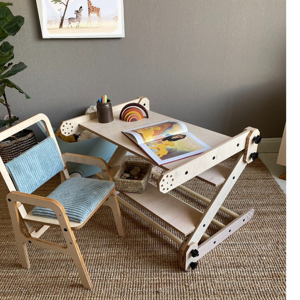 a child's hand drawing on the nabu whiteboard tabletop during creative play