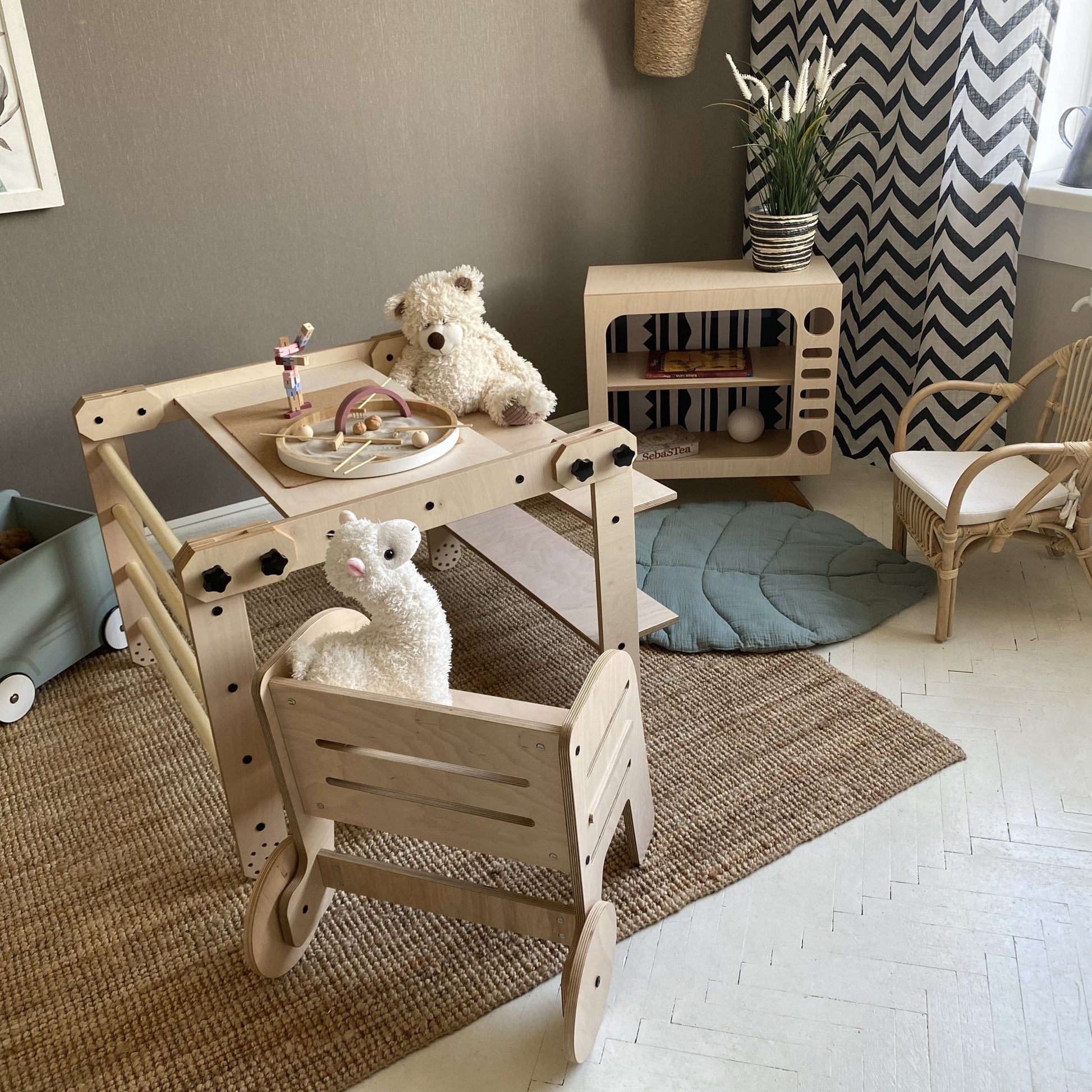 a child drawing on the nabu set's whiteboard tabletop in a sunlit playroom
