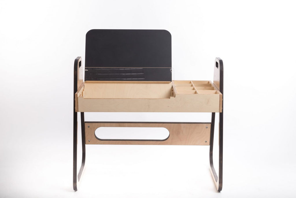 elegant julle kids art table with natural birch wood and opal white laminate in a refined home setting