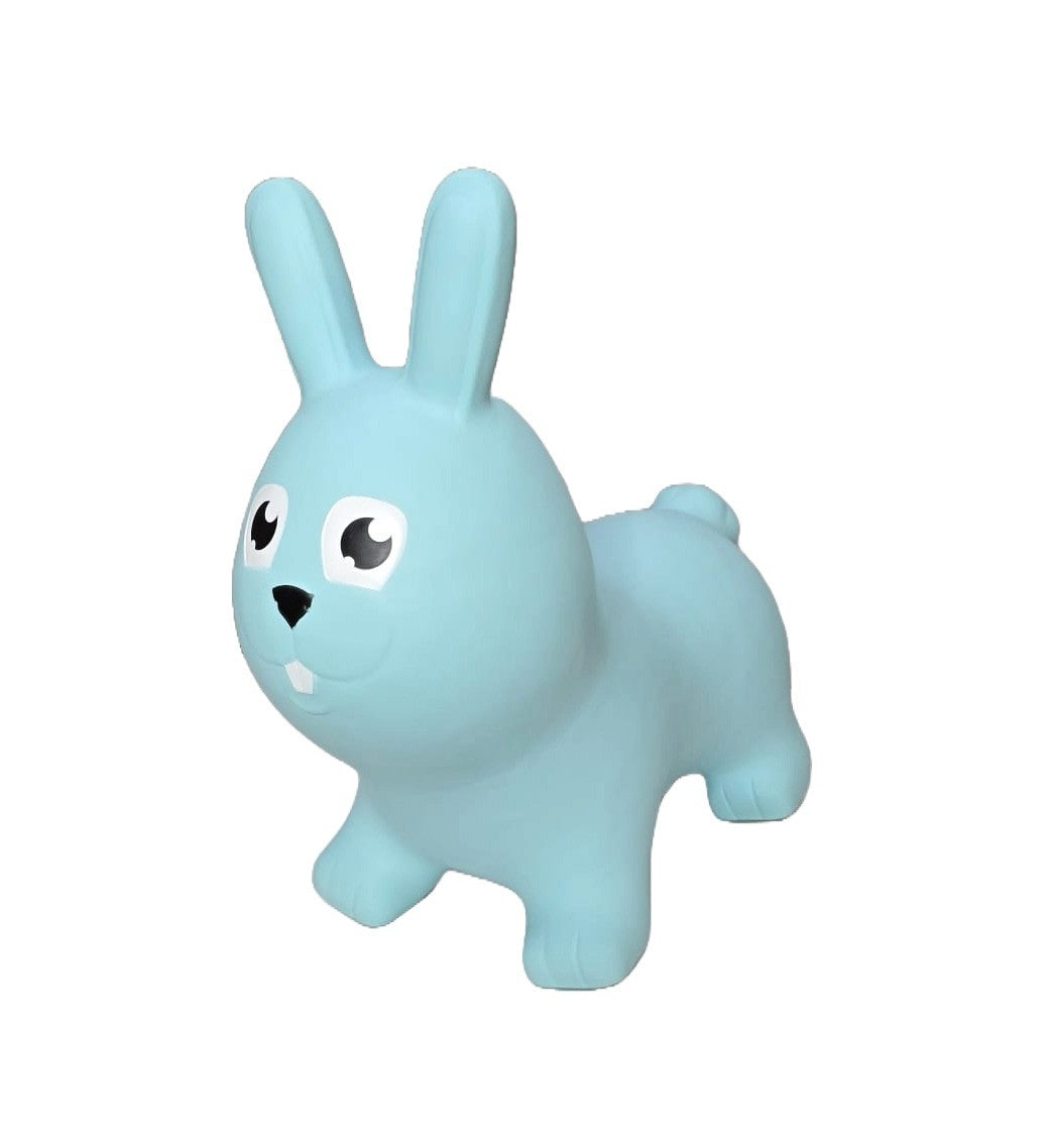 confident toddler bouncing high on a vibrant blue bunny hopper toy indoors