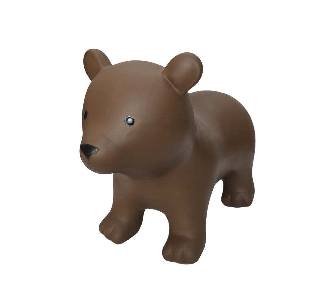 soft brown bear jumpy toy in warm morning light, a comforting companion for toddler play