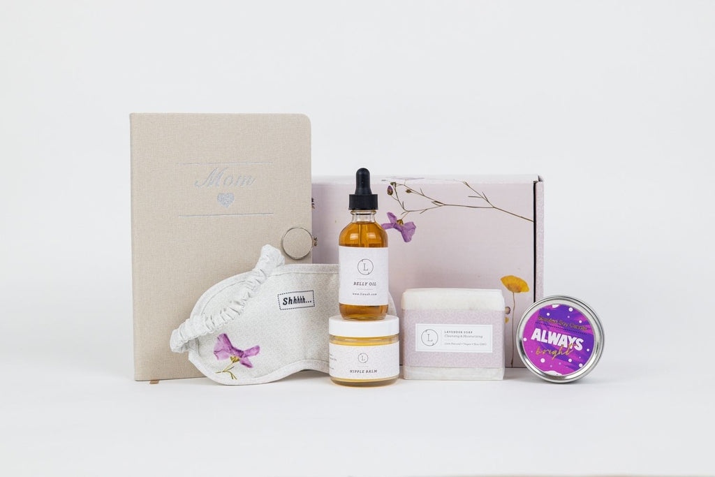 confident display of a thoughtful mom-to-be gift set with balm, candle, and journal