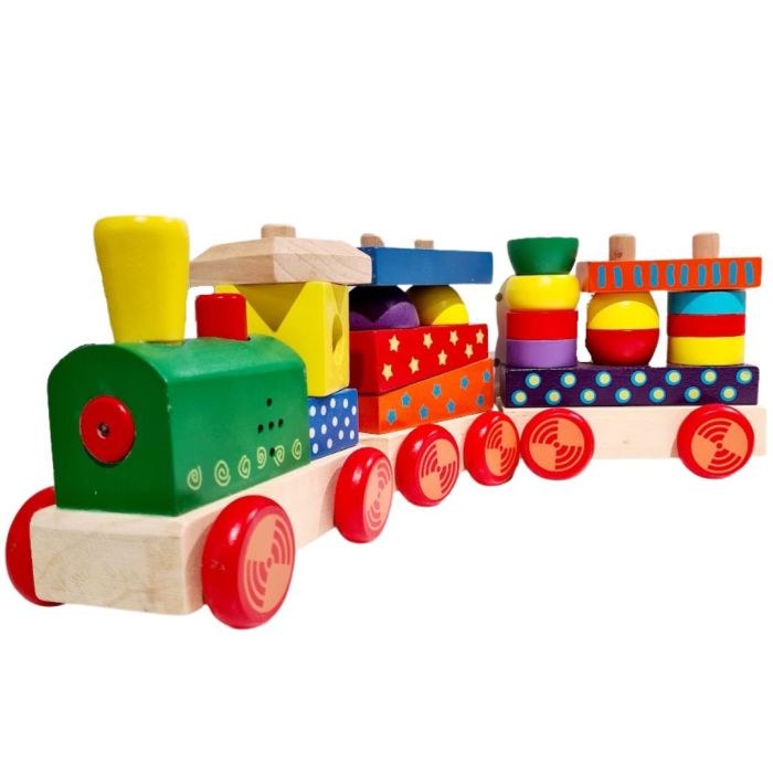 a soft-focus shot of a child's hands gently stacking colorful wooden train blocks