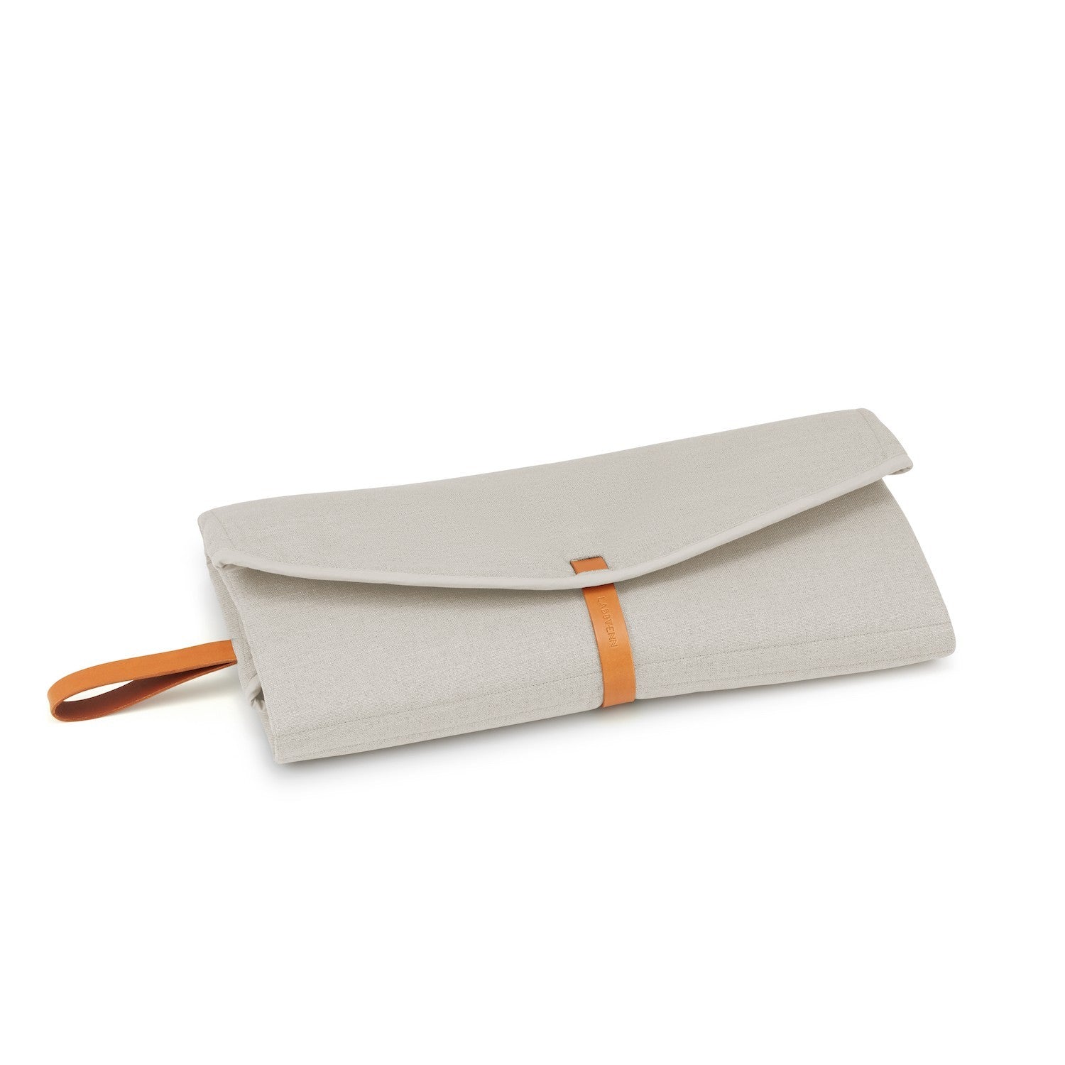 close-up of the okka travel mat's durable beige fabric and practical leather belt closure