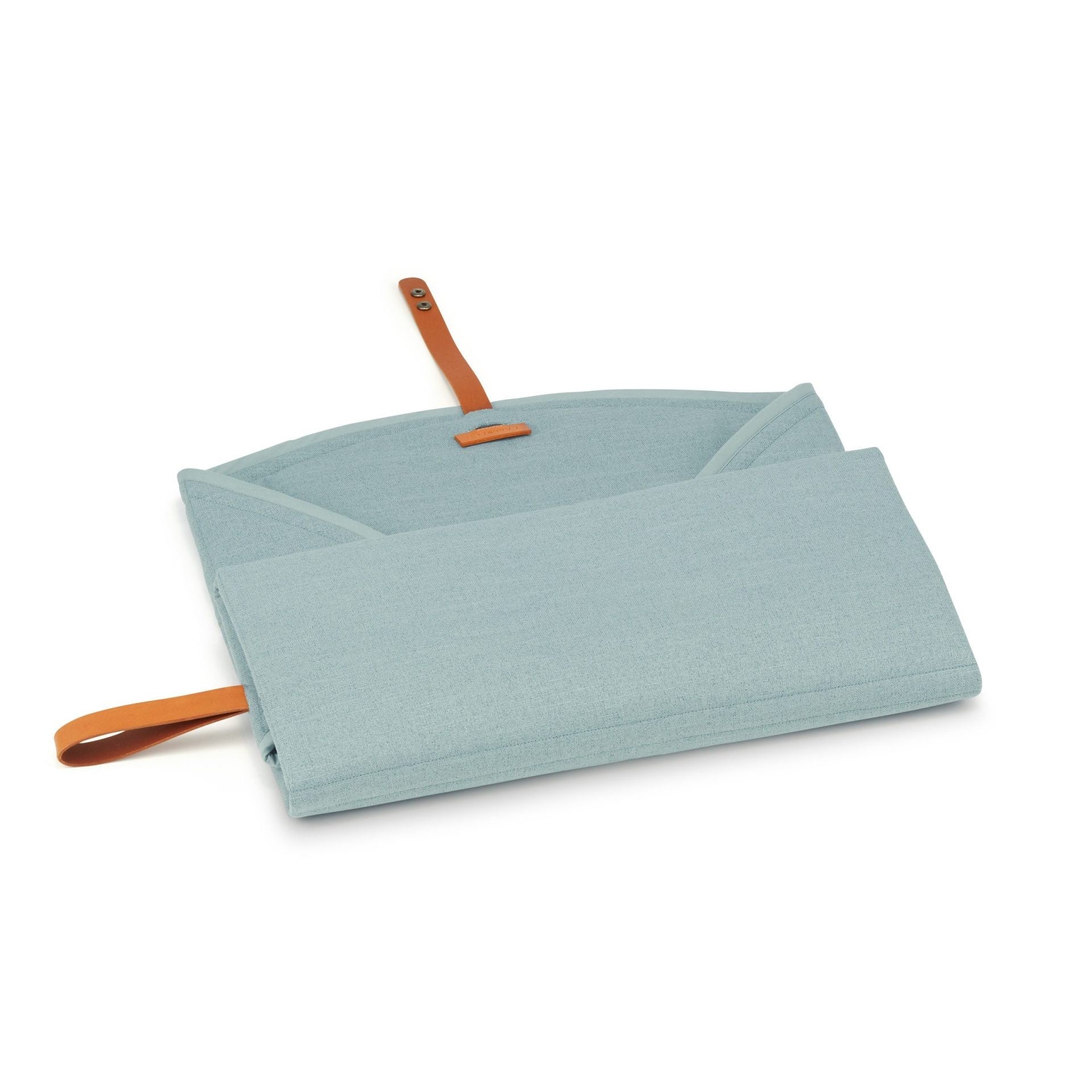 elegant soft teal dog travel mat with leather accents, folded neatly on a stylish bag
