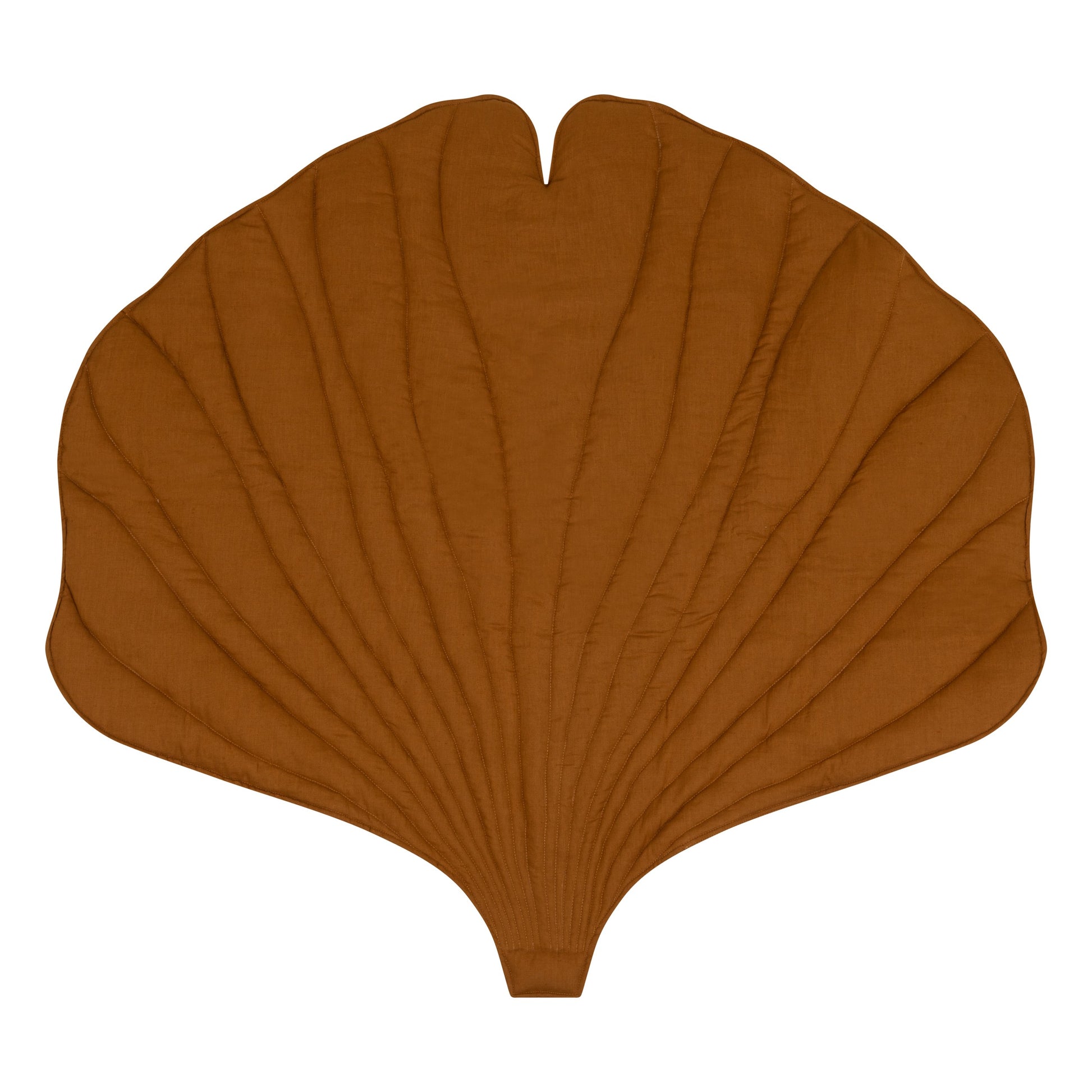 handmade caramel ginkgo leaf playmat laid flat on hardwood floor showing its practical size and plush texture