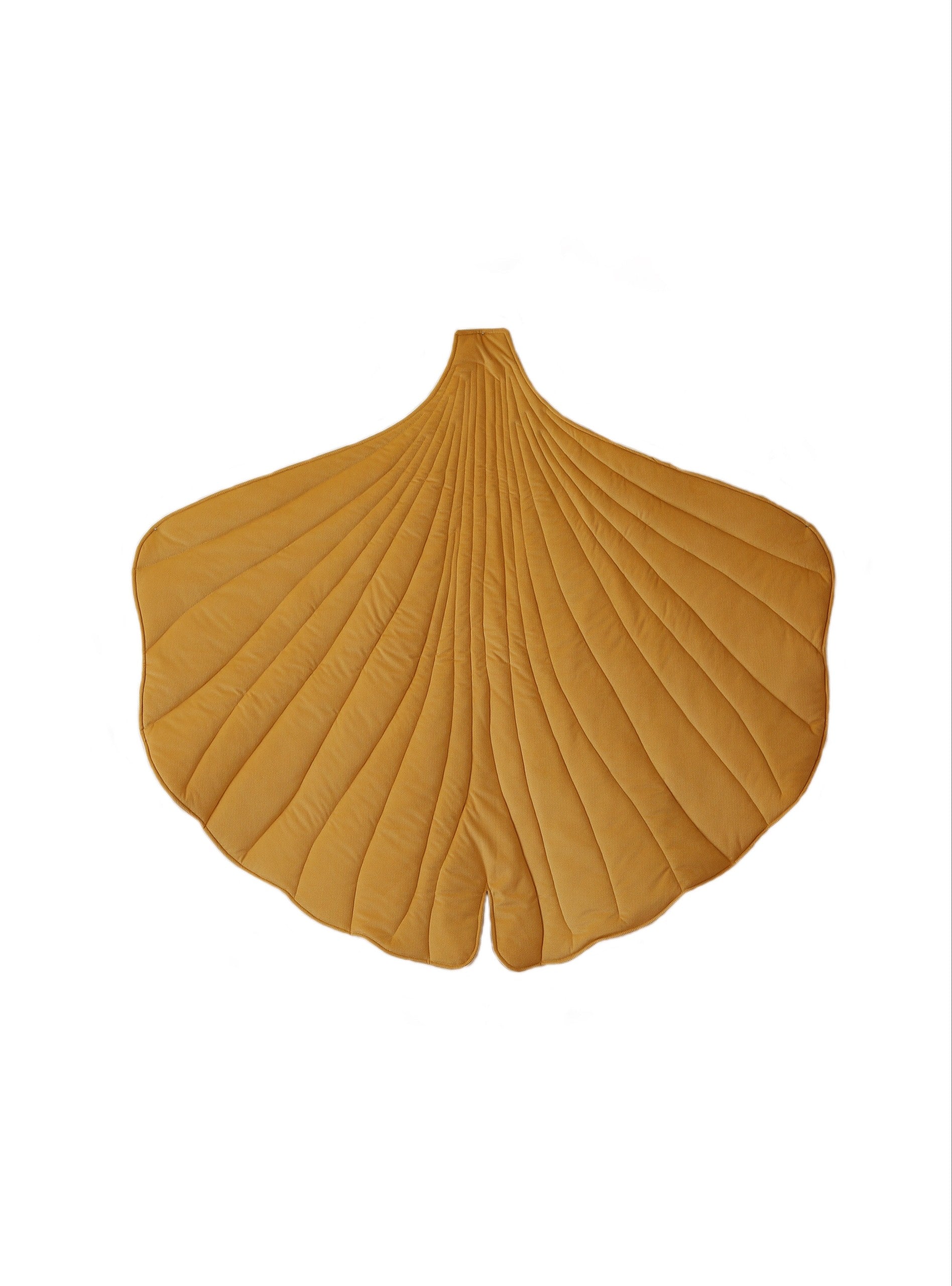 yellow ginkgo leaf playmat laid flat on grass, showcasing its soft velvet texture and practical size for outdoor play