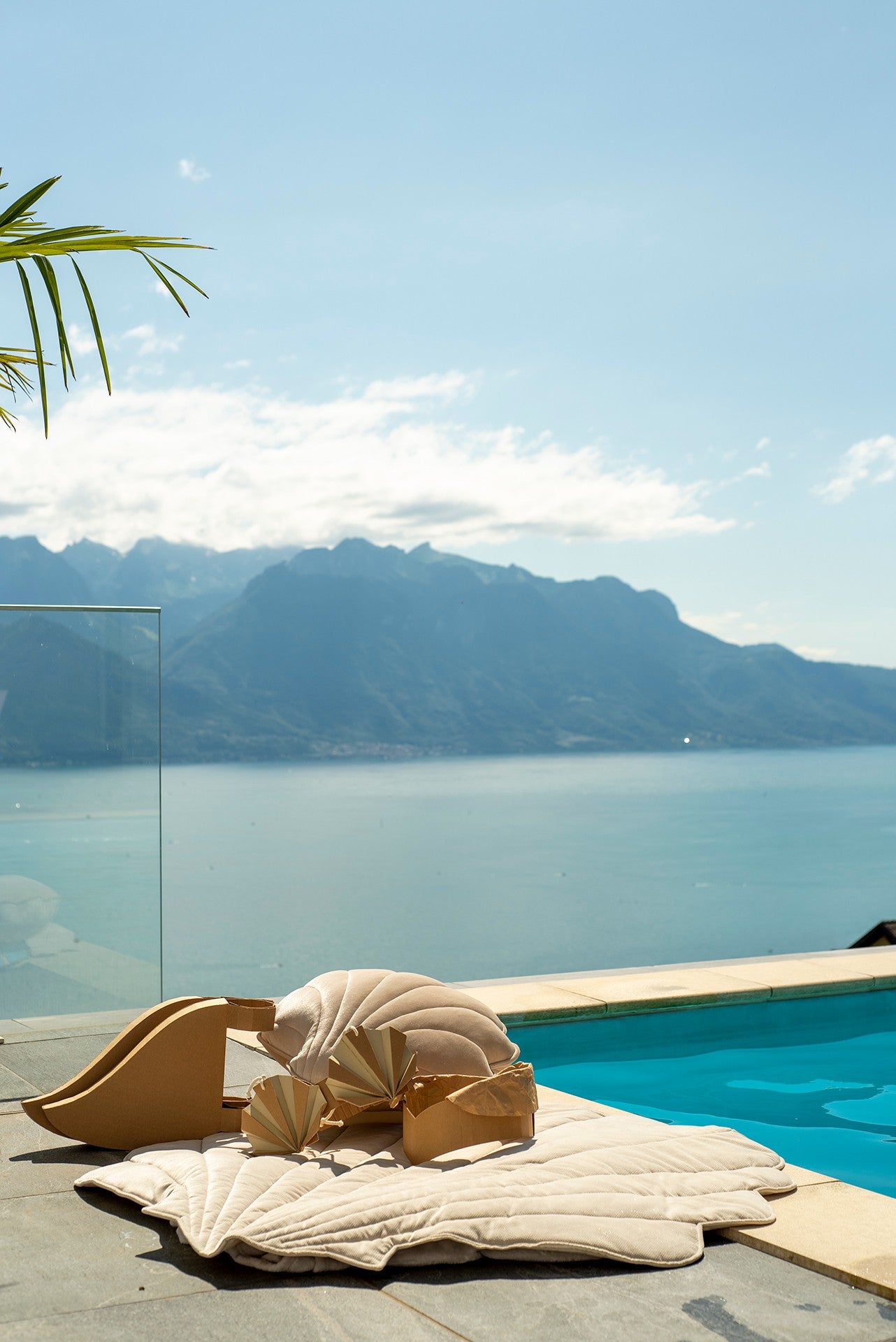 soft beige ginkgo leaf playmat in a cozy nursery corner, inviting quiet play