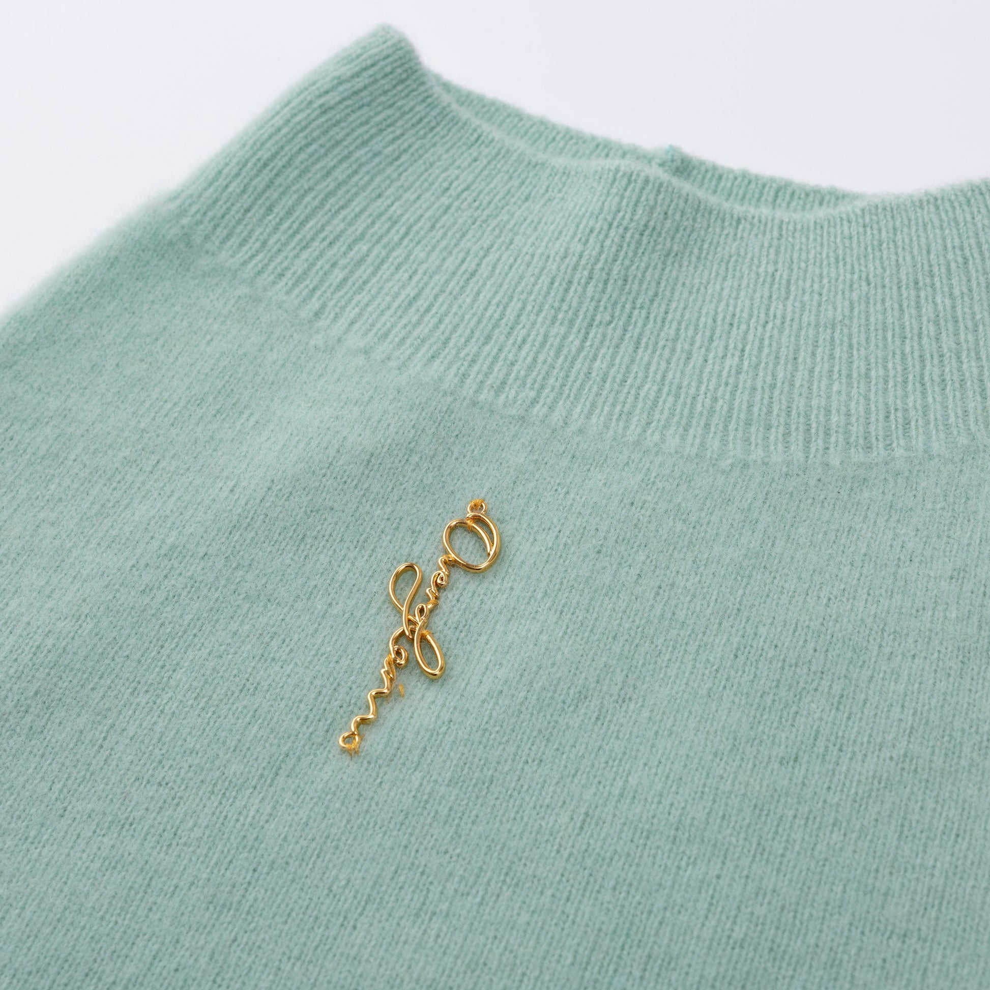 Sleeveless Wool Jumper with Golden Metal Logo