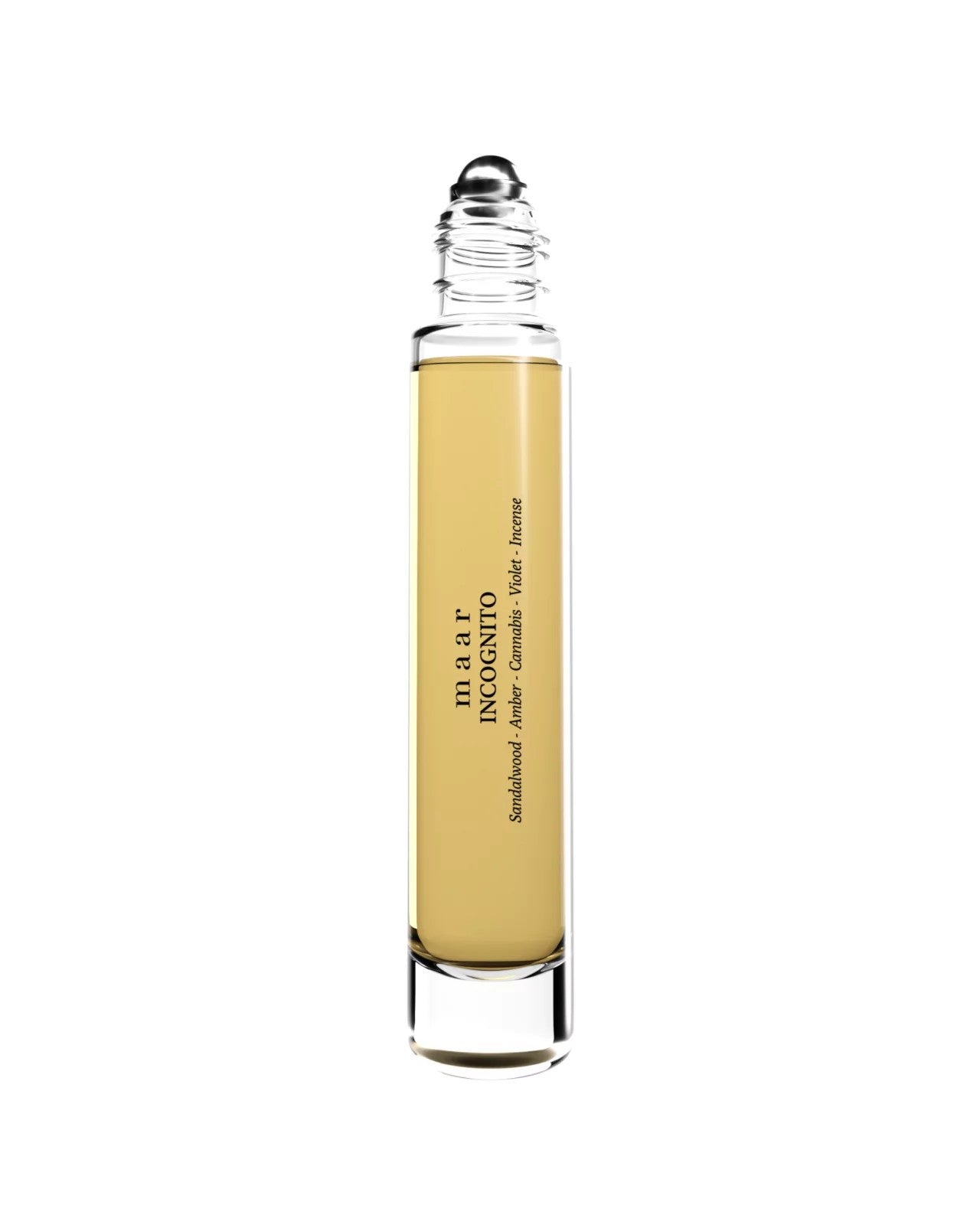 softly lit incognito perfume oil roll-on bottle resting on a textured linen cloth