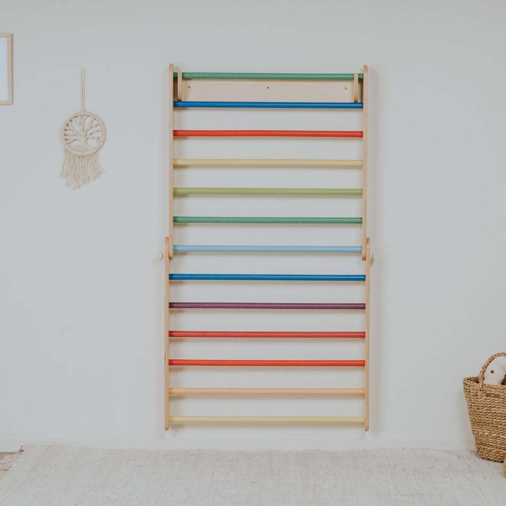 elegant scandinavian rainbow climber and swedish wall in a minimalist living room setting
