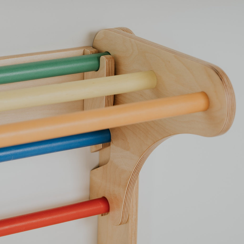 close-up detail of the birch plywood swedish wall showing secure rungs and non-toxic finish