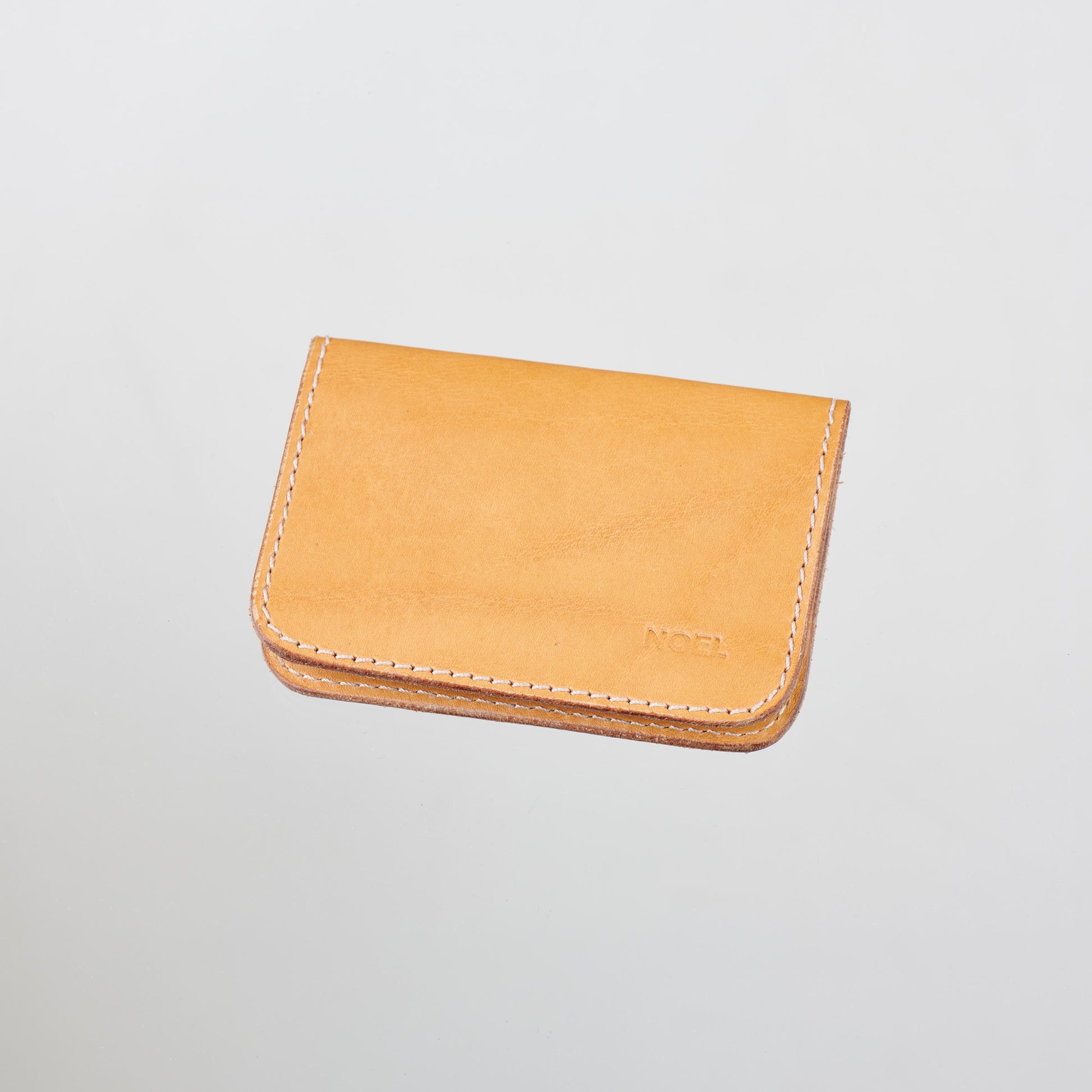 Light on Noeli Ultra-Minimalist Leather Card Holder with Cork Lining - Handcrafted in Tartu, Estonia by Noel at www.brixbailey.com