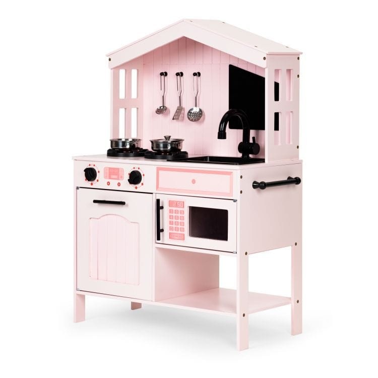 bold front view of a pink wooden kids kitchen with metal pots and a clicking stove