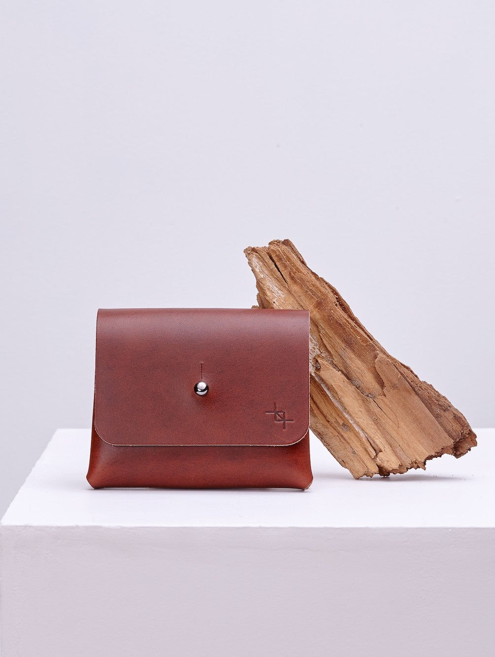 bold close-up of deep pouchie minimalist leather wallet with dual compartments