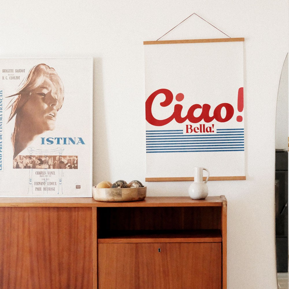 ciao bella poster in soft morning light on a cozy living room wall