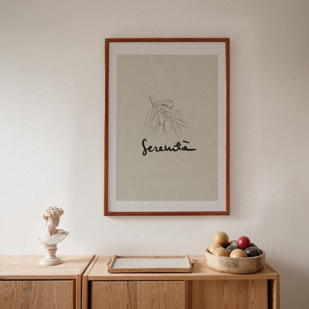 softly lit minimalist serenita poster on a cozy bedroom wall with warm morning light