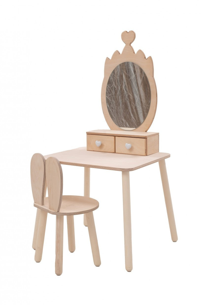 a soft-lit enchanted princess beauty table with a large mirror and drawers for dress-up storage