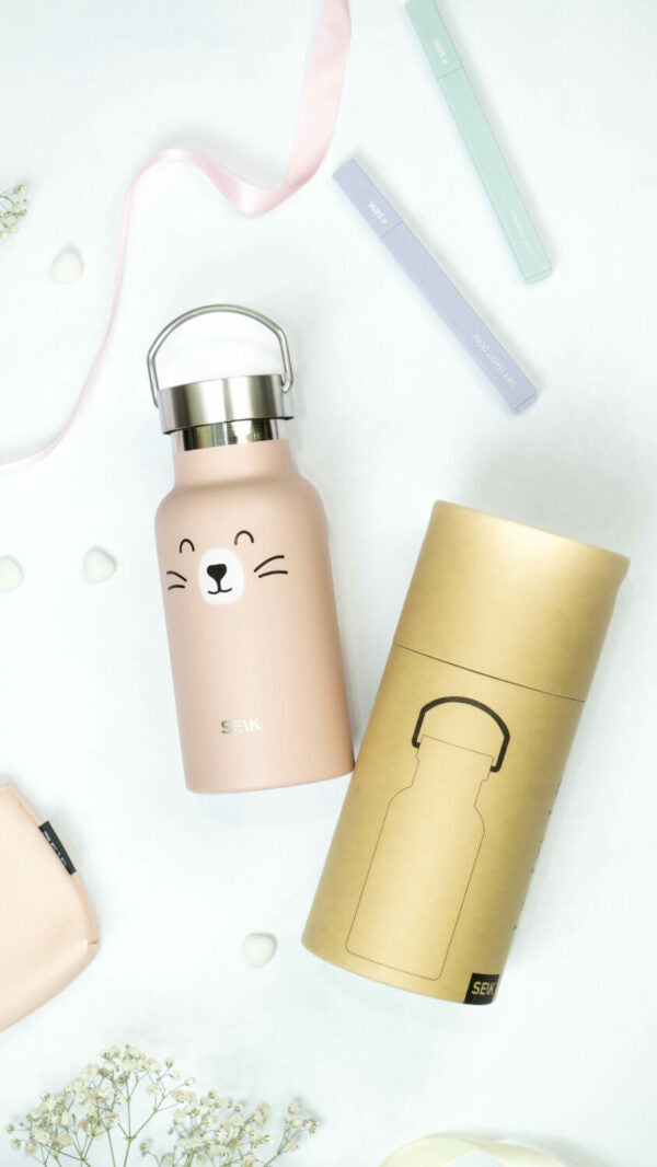playful cat water bottle for kids with a happy cat face design on a sunny yellow background