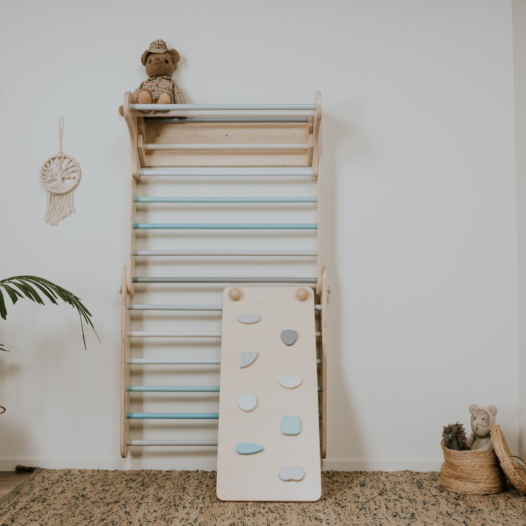 a soft pastel climbing ramp for toddlers in a cozy, sunlit nursery setting