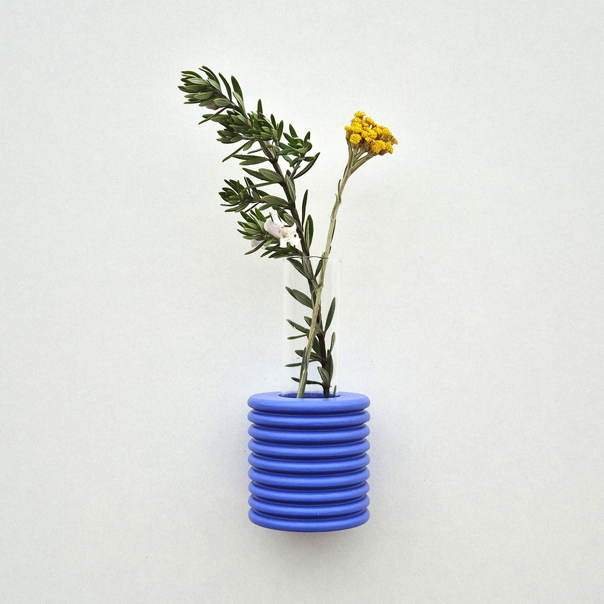 bold blue ribble wall vase made from handcrafted beech wood with a confident modern look