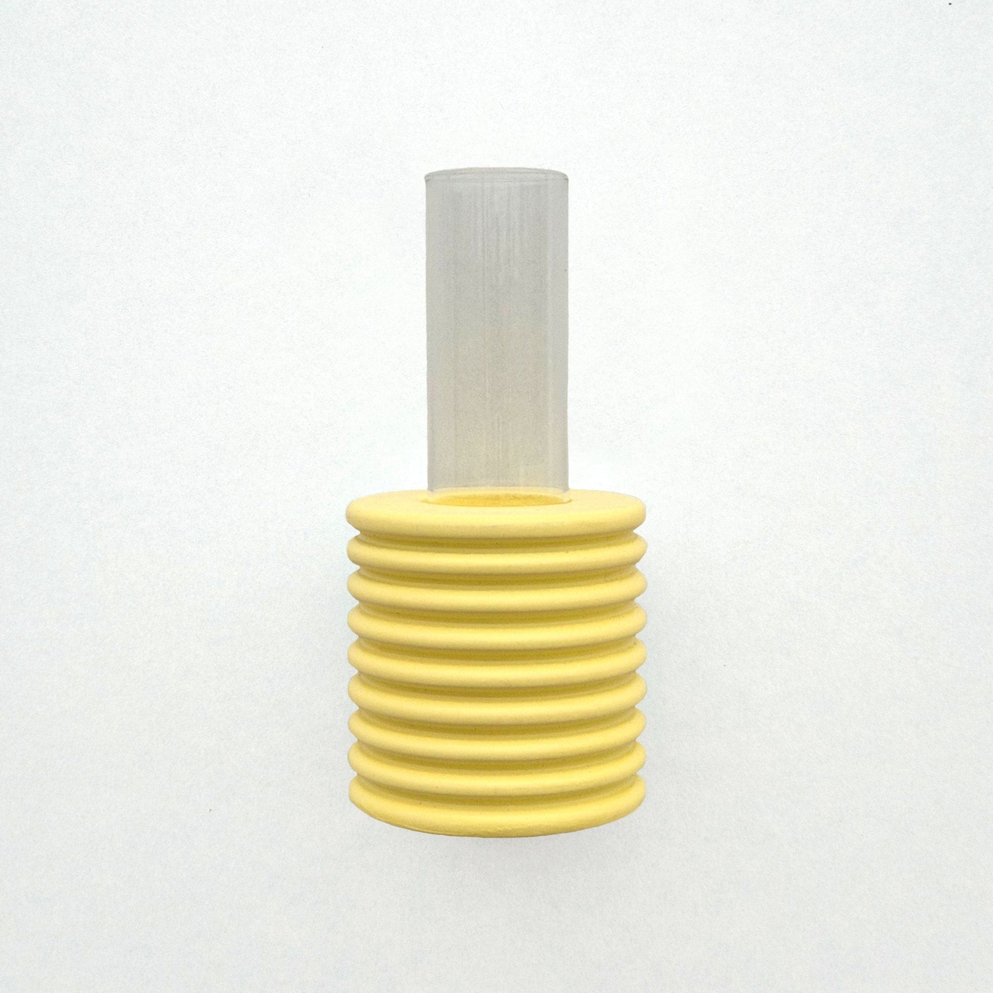 practical bright yellow ribble wall vase with metal hook for easy hanging on a beige wall