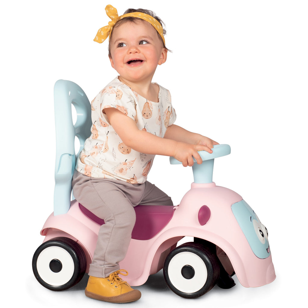 bold front view of the pink maestro 3in1 ride-on with its interactive eyes and horn ready for adventure