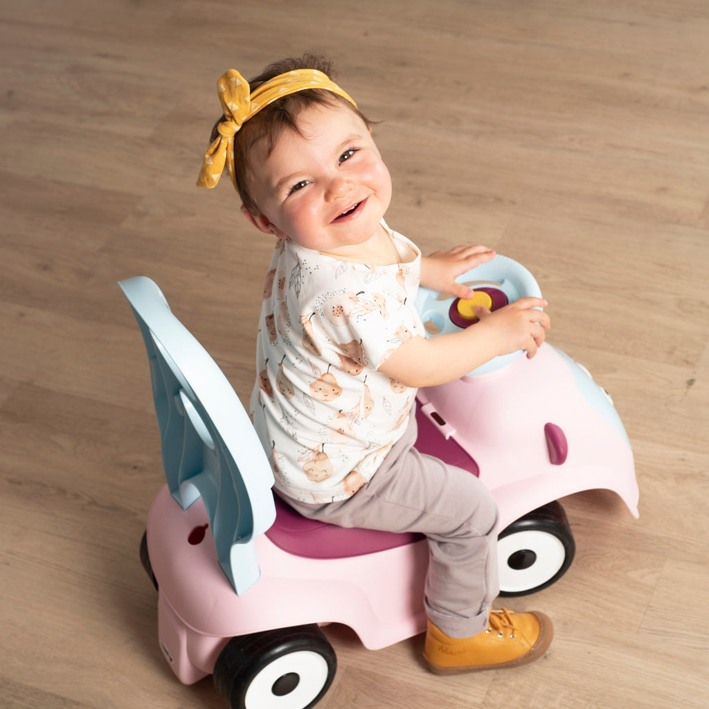 soft pink maestro 3in1 ride-on toy with cozy seat and gentle morning light