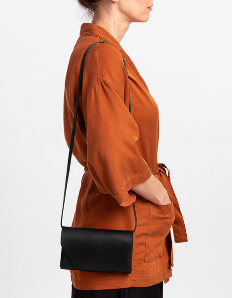 Versatile Capital of Plenty Clutch/Wallet – Elegant & Sustainable Handmade Leather by Stella Soomlais at brixbailey.com