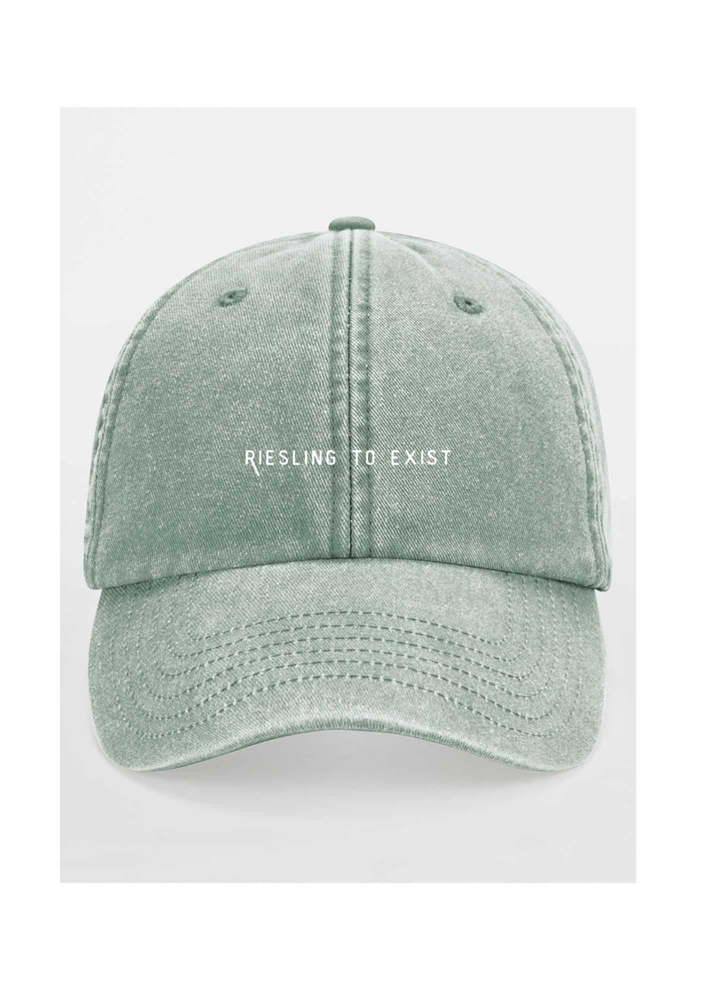 elegant low-profile cotton cap with riesling to exist embroidery, shown in soft morning light