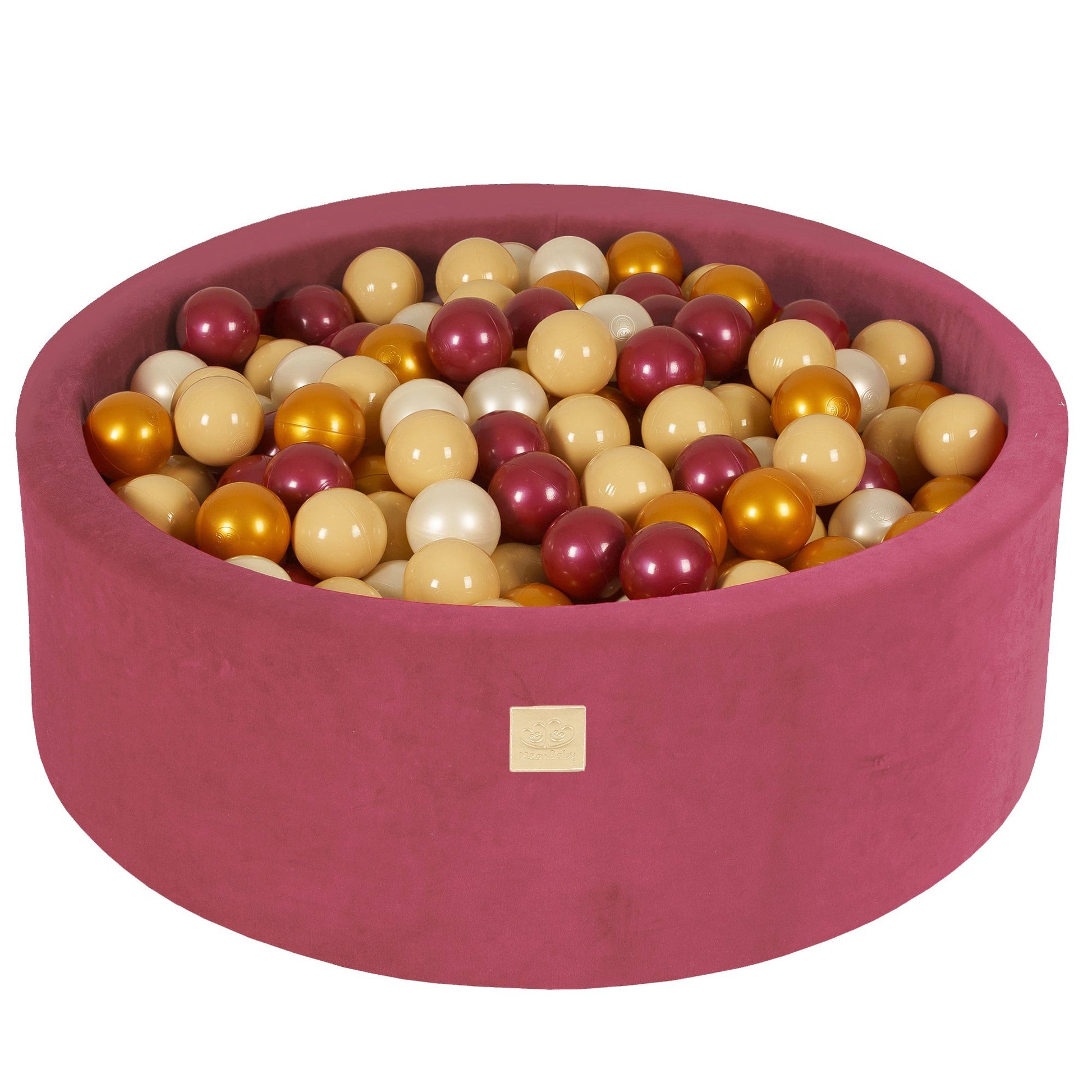 a bold, contemporary gold and burgundy ball pit for stylish, dramatic play