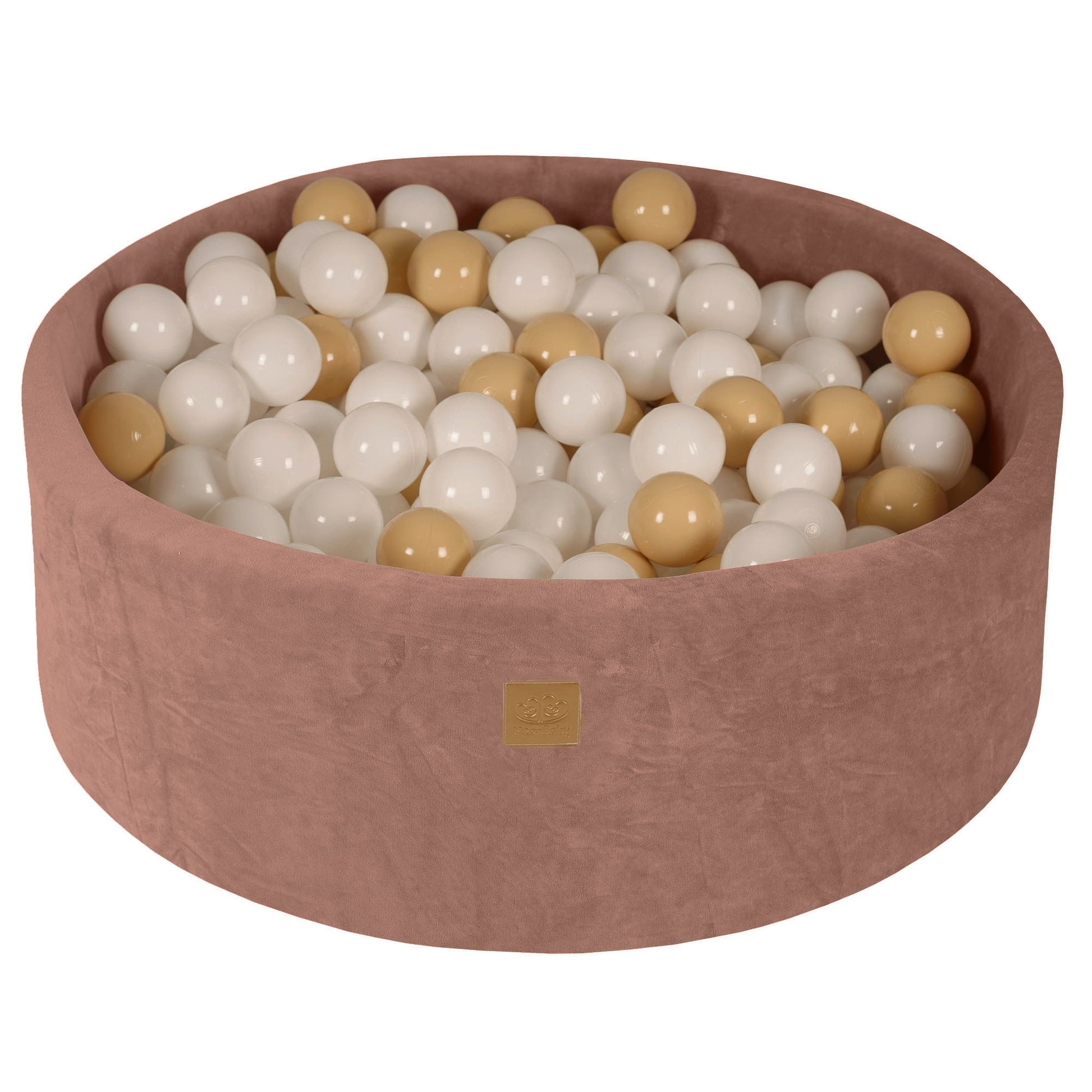 a bold statement piece: a beige velvet ball pit overflowing with soft foam balls in a modern living room
